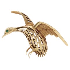 Cartier Goose Bird Brooch in 18kt Yellow Gold with Emerald Eye