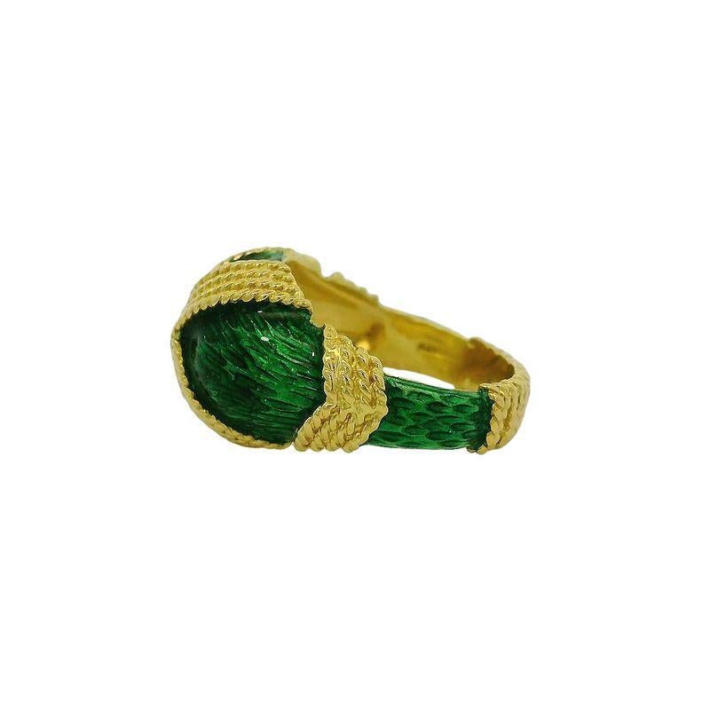 This Cartier band ring features a rich green enamel finish set in 18k gold. Weighing 8.94 grams. Size 5-3/4.
