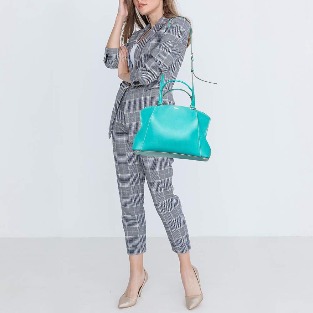 Designer bags are ideal companions for ample occasions Here we have a fashion meets functionality piece crafted with precision. It has been equipped with a well sized interior that can easily fit your small essentials.