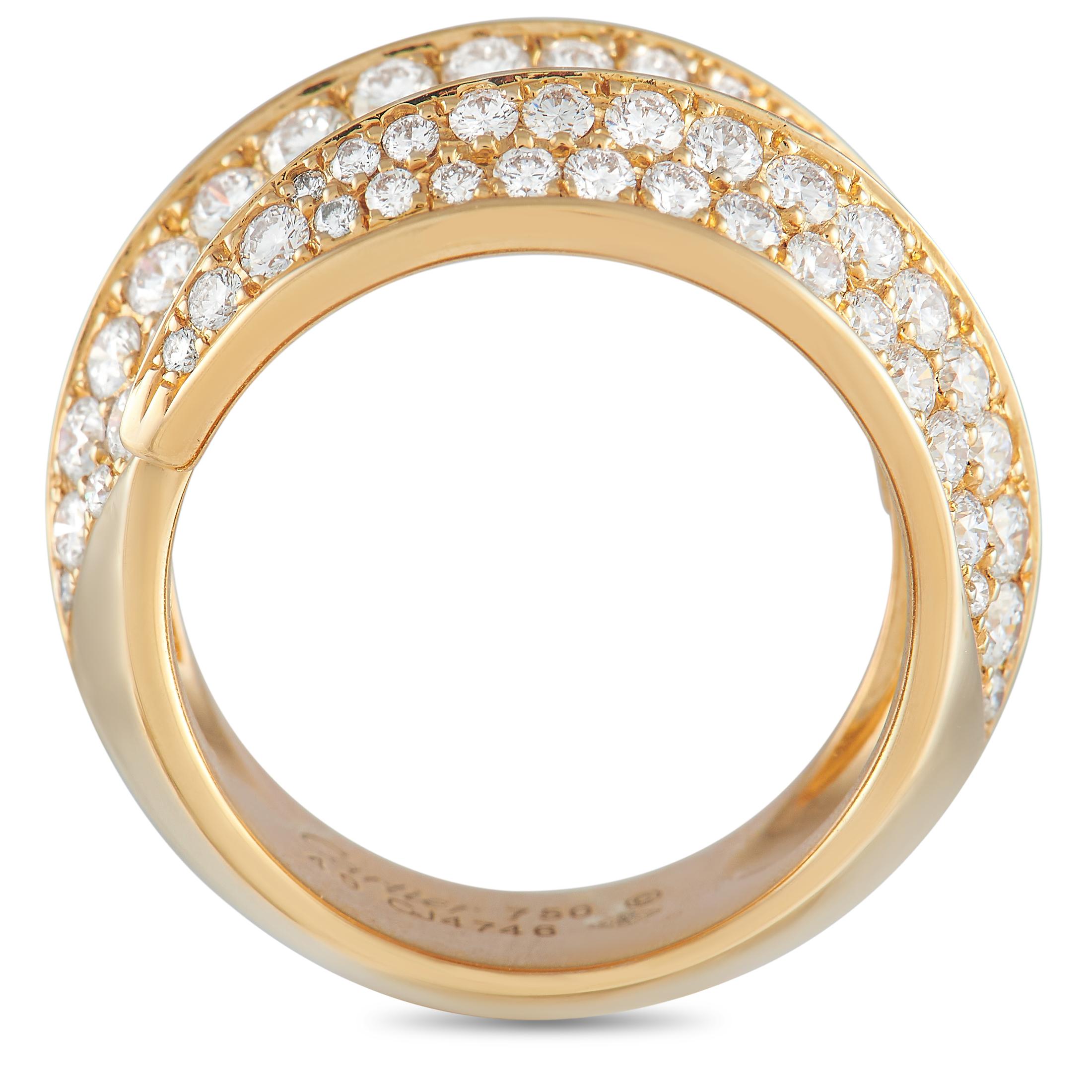 Clean lines and a minimalist 18K Yellow Gold setting provide this Cartier Griffe ring with a graceful sense of movement. Adorned with inset diamonds totaling 1.0 carats, this timeless piece features a 10mm wide band and a 6mm top height. 