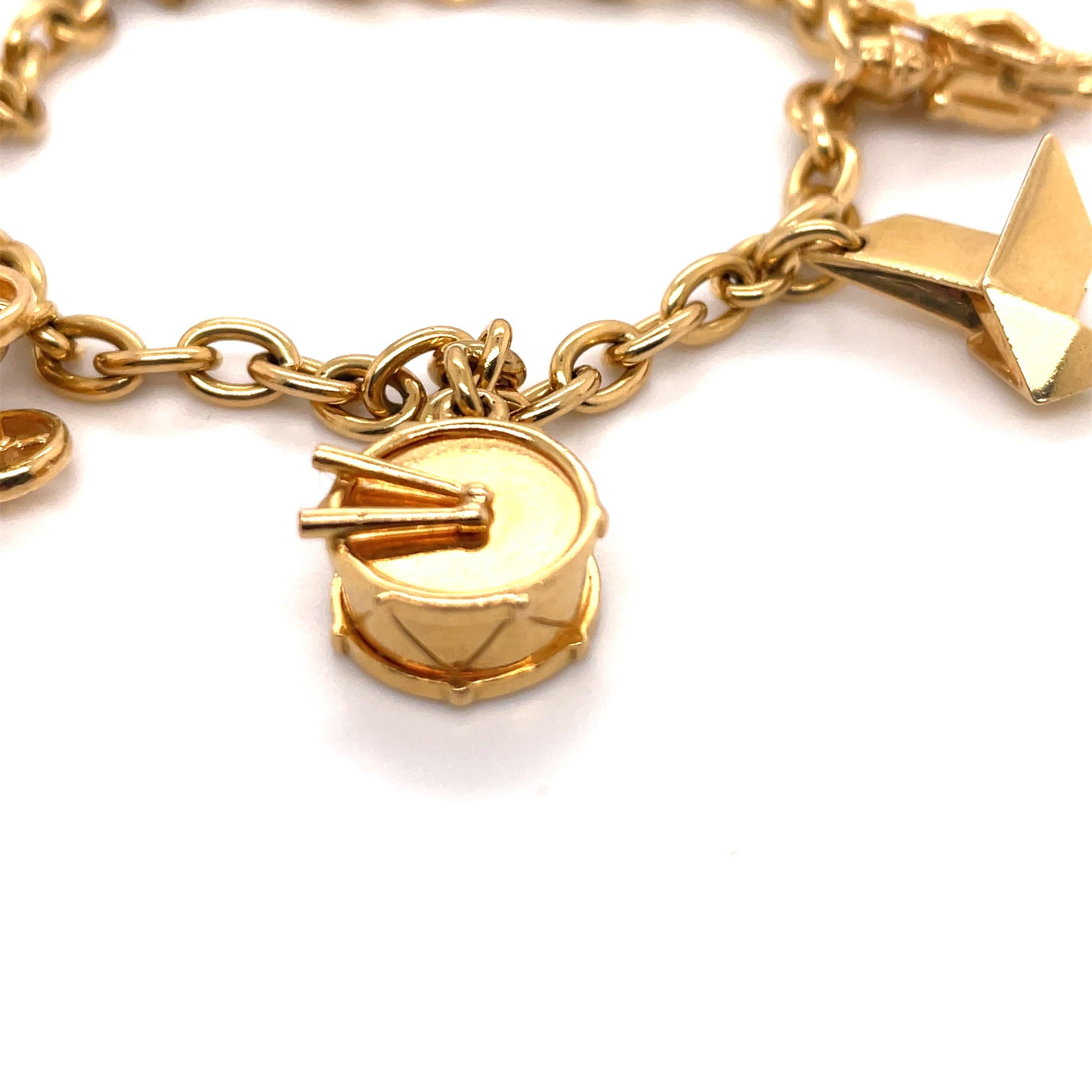 Cartier: 18 Karat Gelbgold Gliederarmband mit Charm-Emblem, 42 Gramm (Zeitgenössisch)