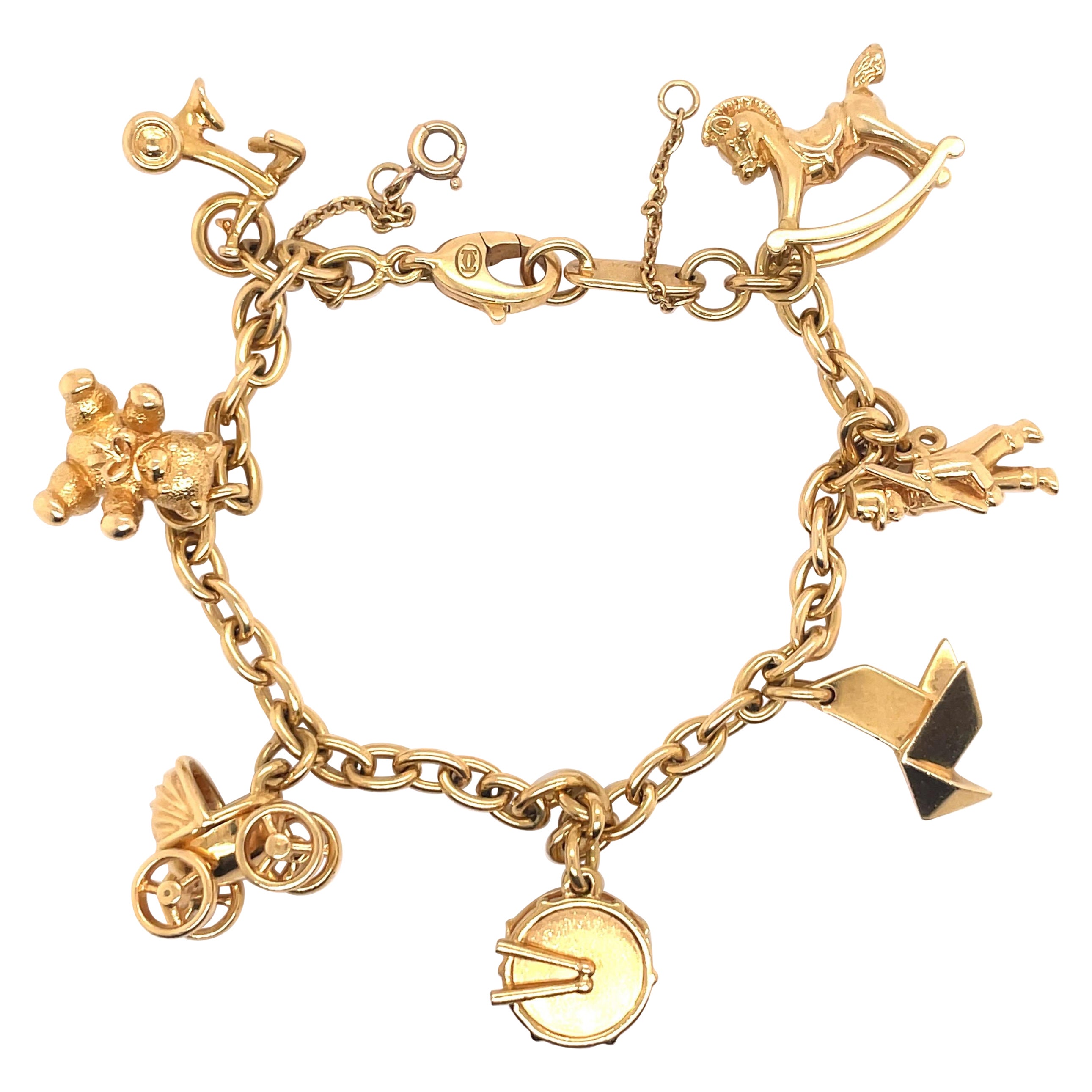 Cartier: 18 Karat Gelbgold Gliederarmband mit Charm-Emblem, 42 Gramm
