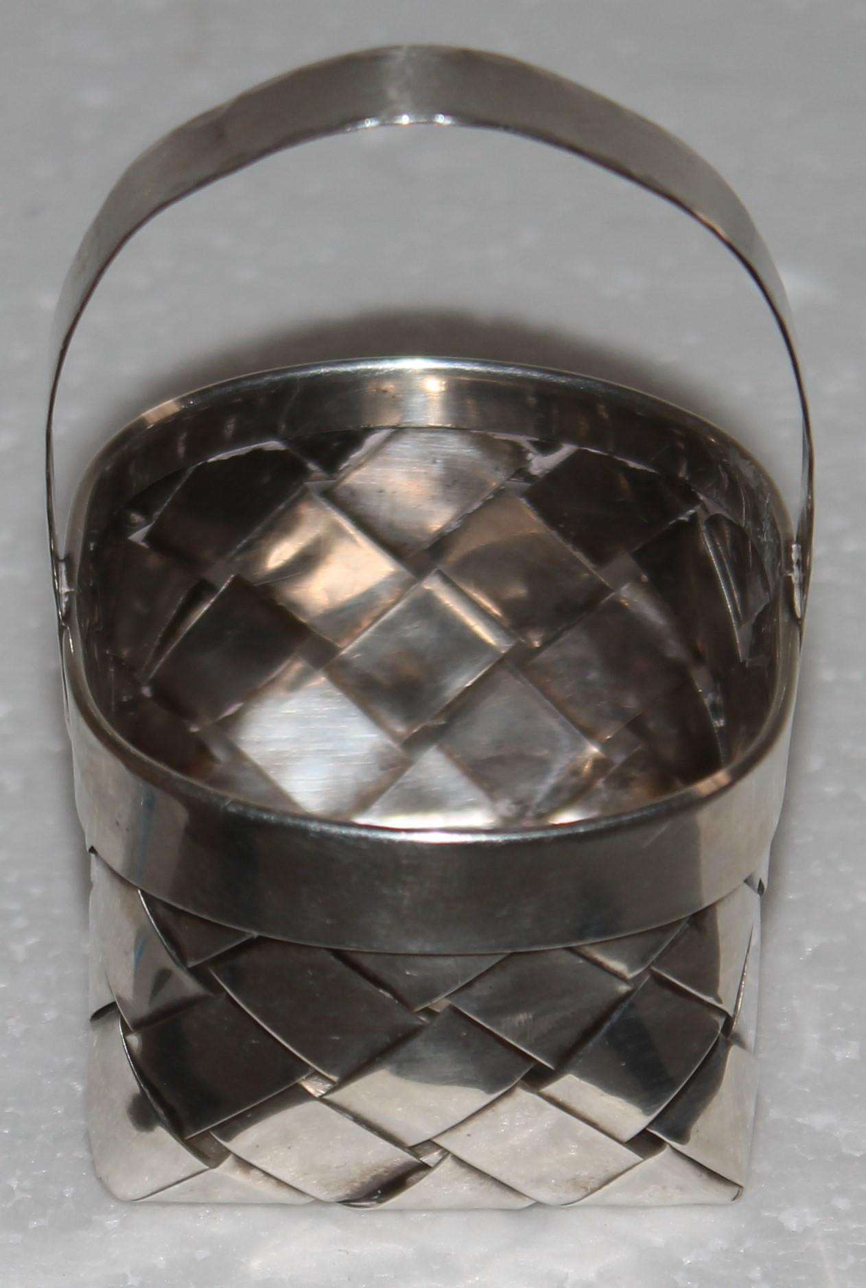This fine construction signed hand made Cartier sterling silver ( heavy weight ) basket is in fine condition. These are quite rare to find in such great condition.