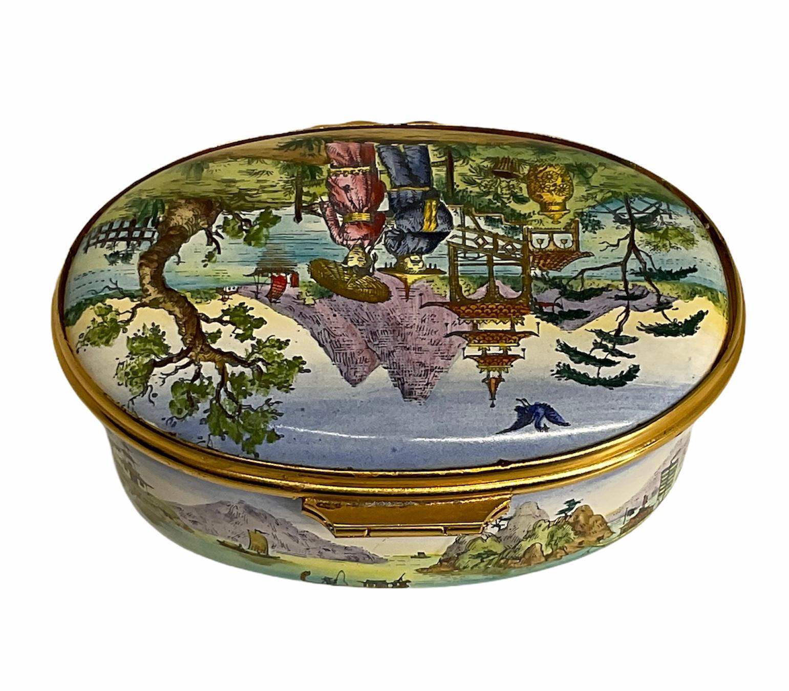 This is a Cartier hand painted enamel porcelain oval trinket box. It depicts an East Asian landscape with a couple wearing oriental outfits in the front of the lid. Also, there is an East Asian sea with ships landscape hand painted around the base.