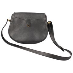 Cartier handbag in black leather.
