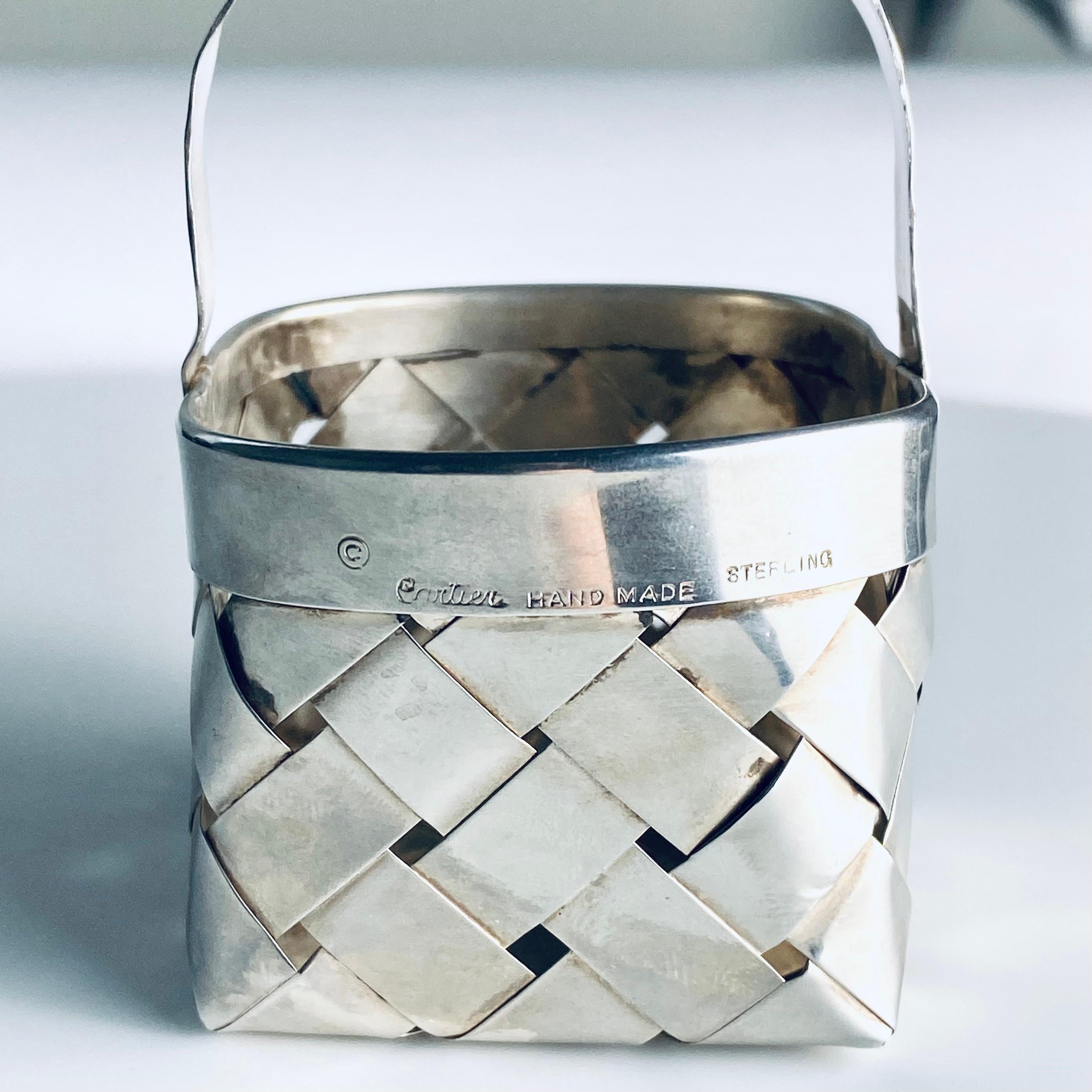 A Compact Masterpiece from a Legendary Maison
Infuse your space with the heritage and refinement of this Cartier Handmade Sterling Silver Basket. Known for their impeccable craftsmanship, Cartier demonstrates a masterful approach here by creating a