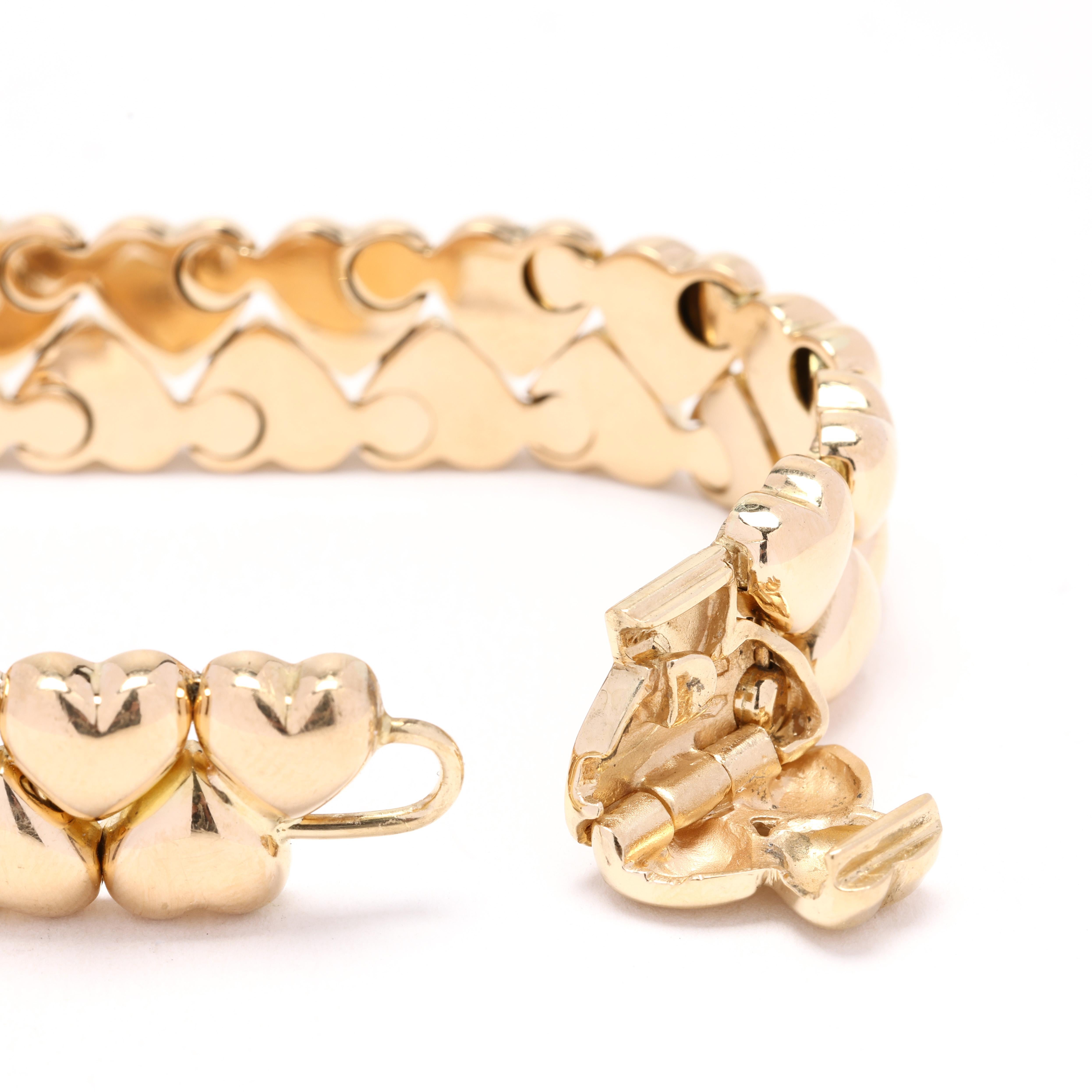 Bracelet Cartier, or jaune 18 carats, longueur 7 pouces, multi-cœurs, designer Bon état à McLeansville, NC