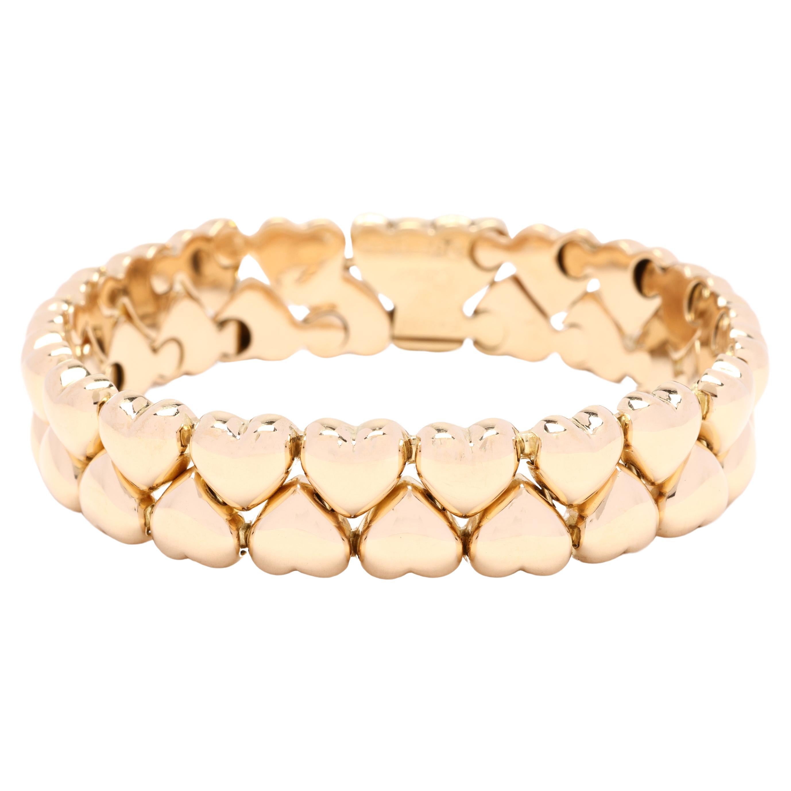 Bracelet Cartier, or jaune 18 carats, longueur 7 pouces, multi-cœurs, designer