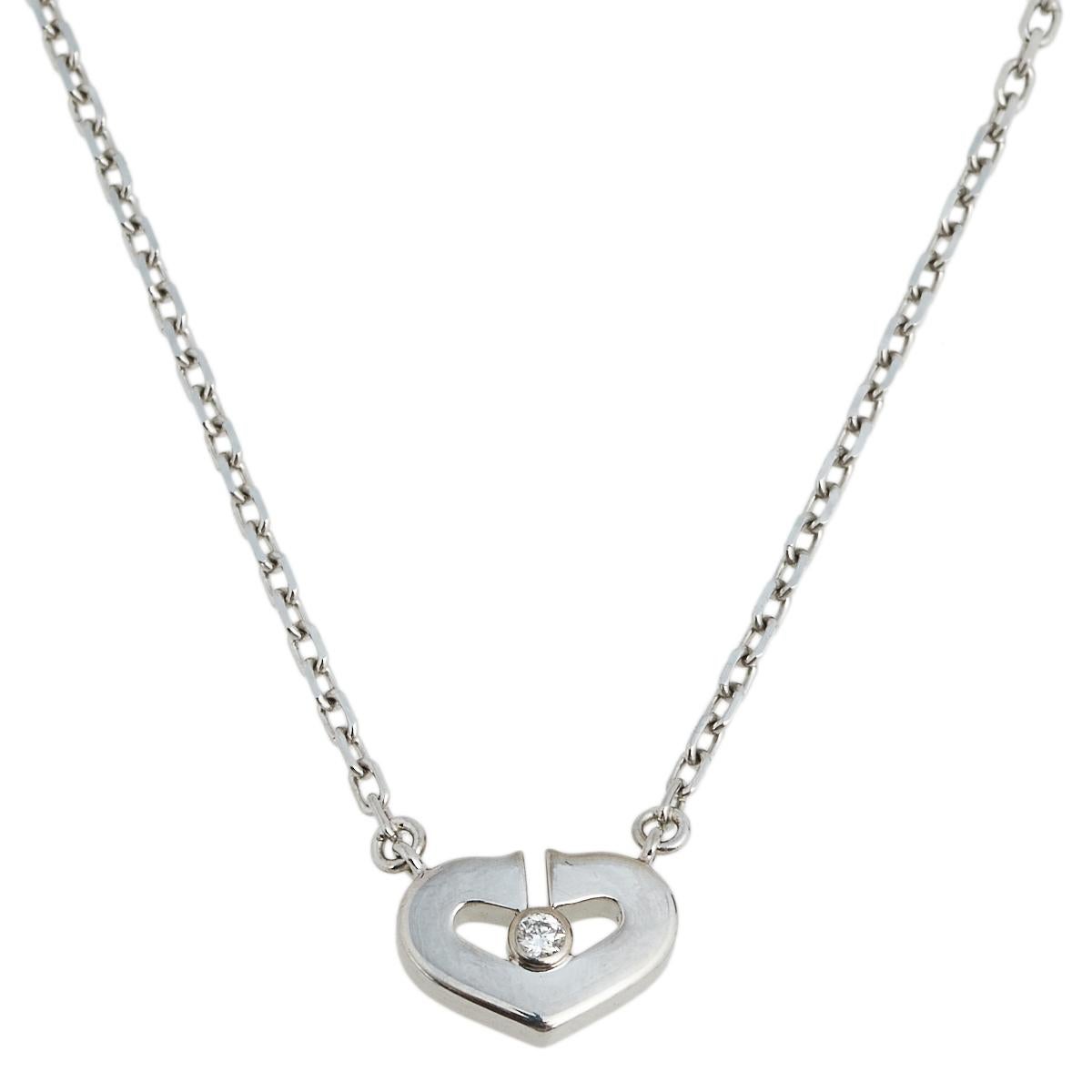 Looking for the perfect jewelry design that represents true love? Go for this stunning Cartier Heart C necklace. Fashioned in 18K white gold, this alluring piece features a C-heart that opens at the top and is adorned with a dazzling diamond at the