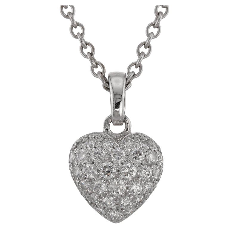 CARTIER Collier en or blanc 18 carats avec pendentif cœur pavé de
