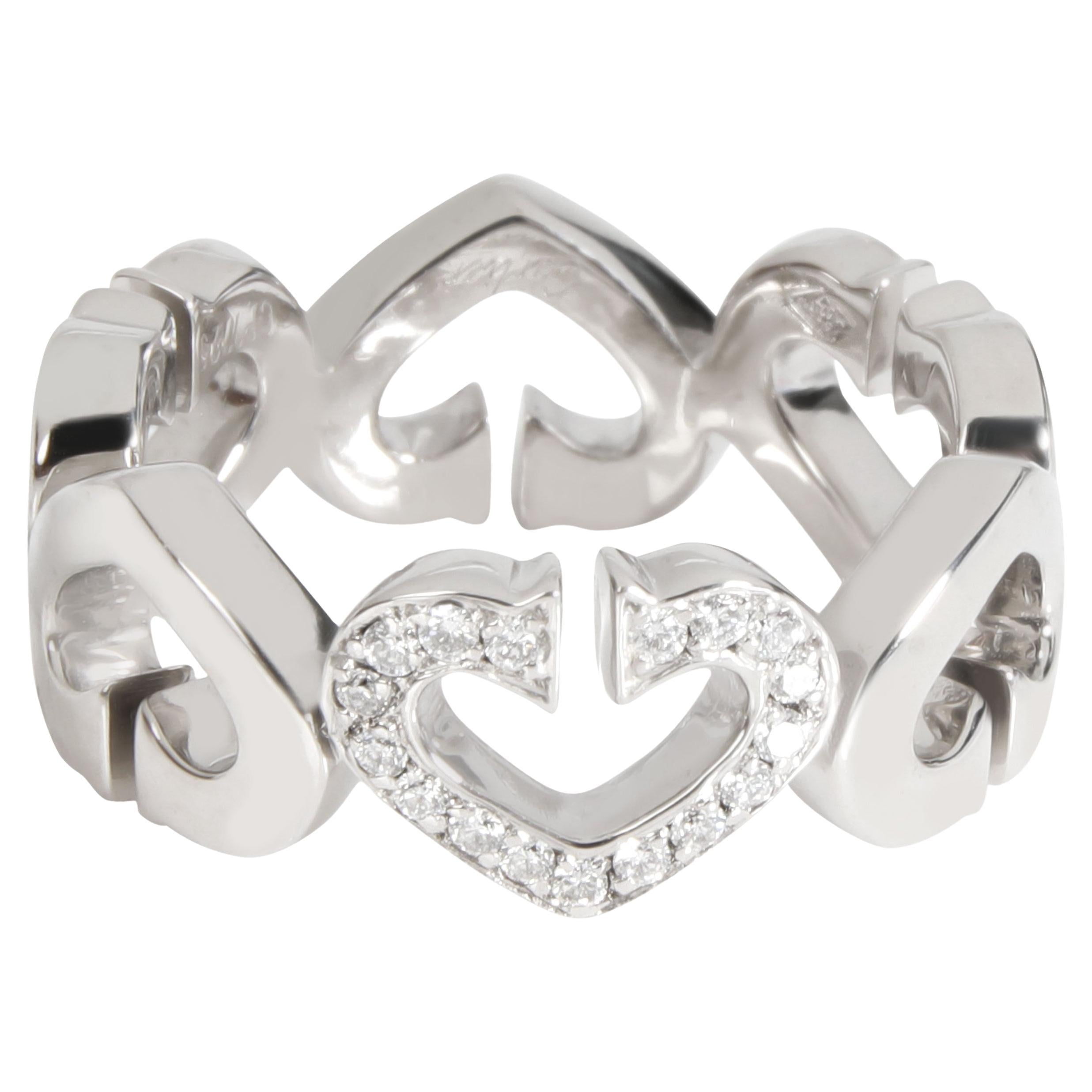 Cartier Bracelet cœurs et symboles en or blanc 18 carats et diamants 0,17 carat