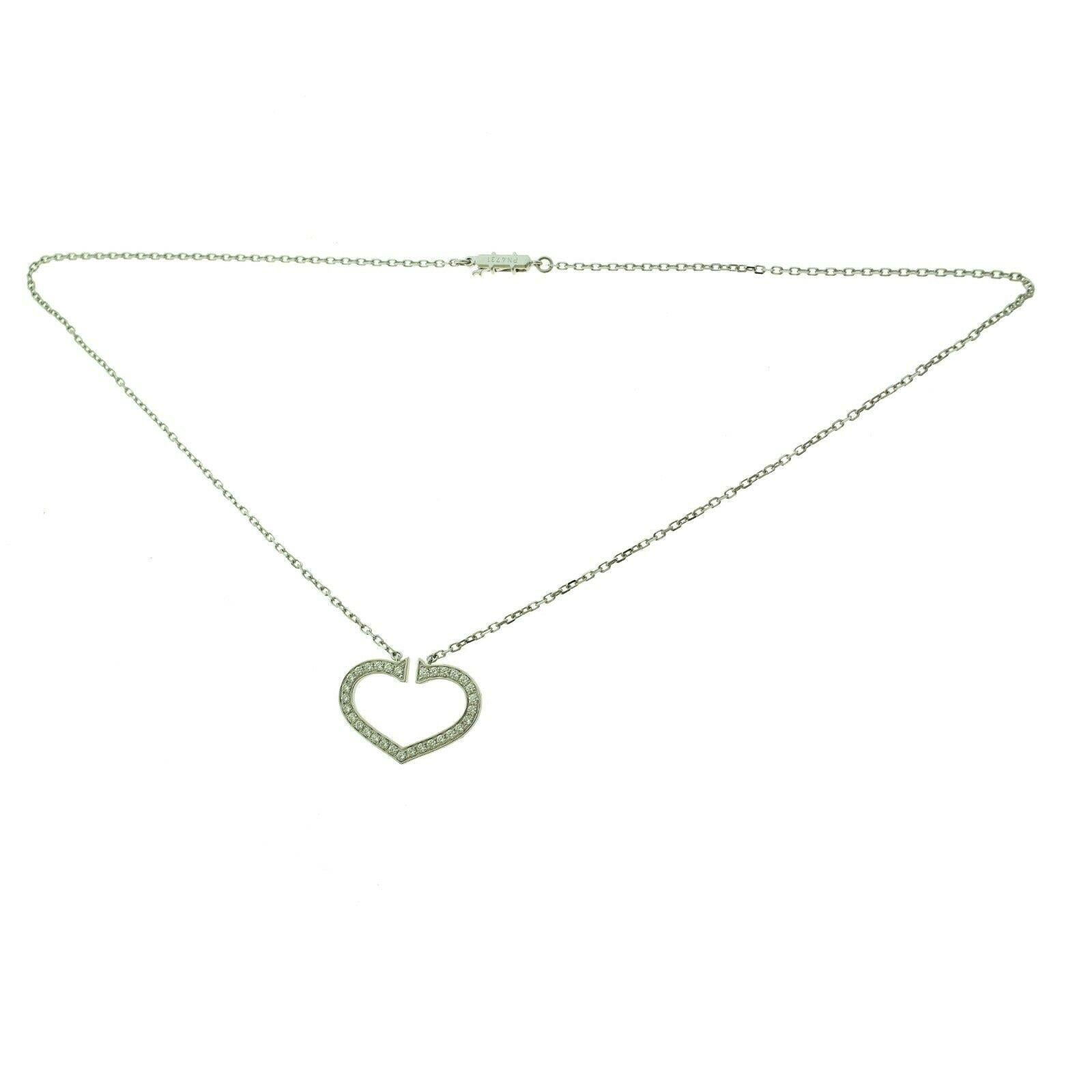 Taille ronde Cartier Collier pendentif cœurs et symboles en or 18 carats avec grand cœur en diamants en vente