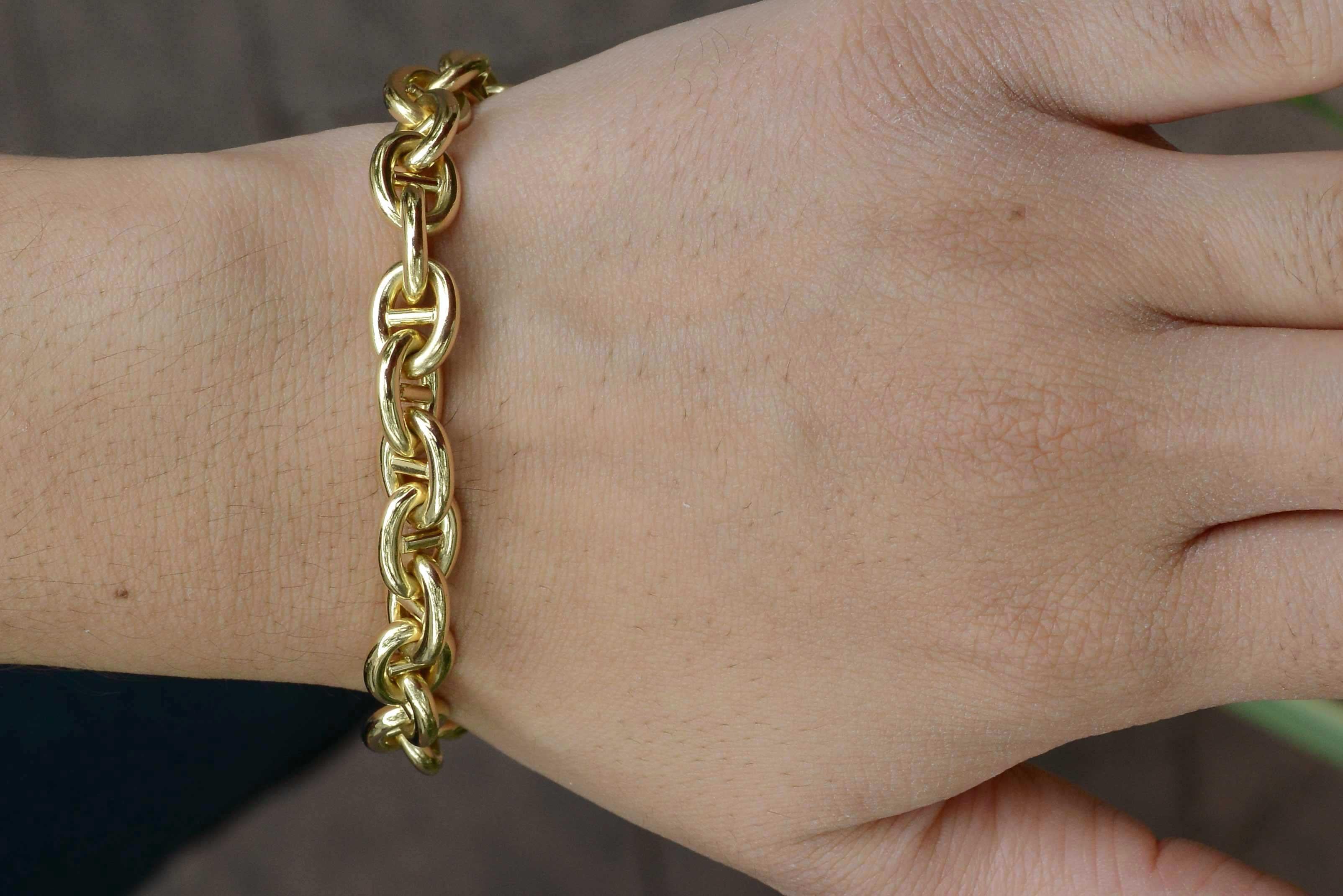 From the iconic House of Cartier comes this heavy 18K gold link bracelet. At 8