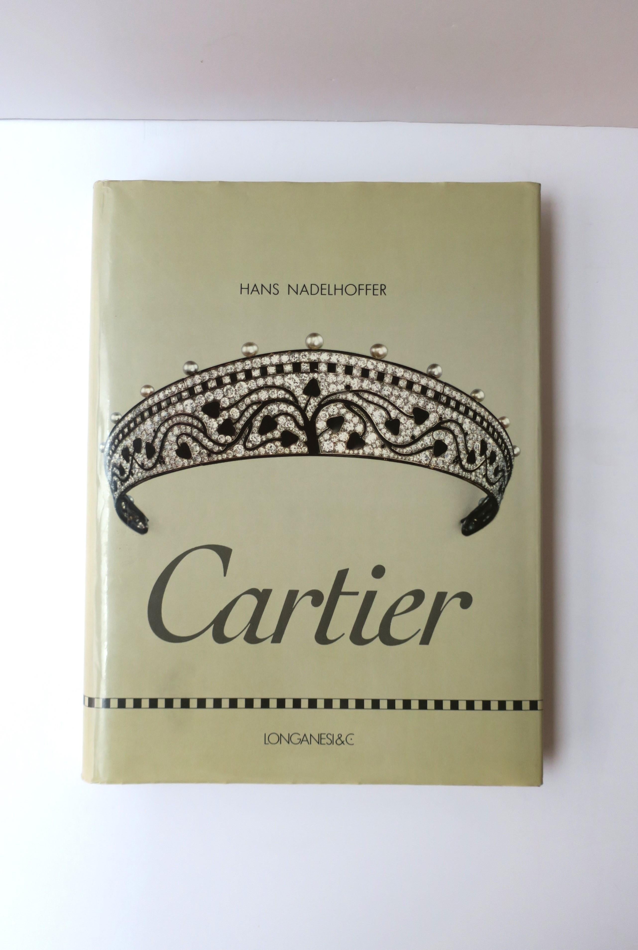 A very beautiful hard-cover Cartier High Jewelry coffee table book by Hans Nadelhoffer, 1984. Book showcases royal and high jewelry, timepieces, and precious objects, covering various design styles such as the Art Deco period and more. A great piece