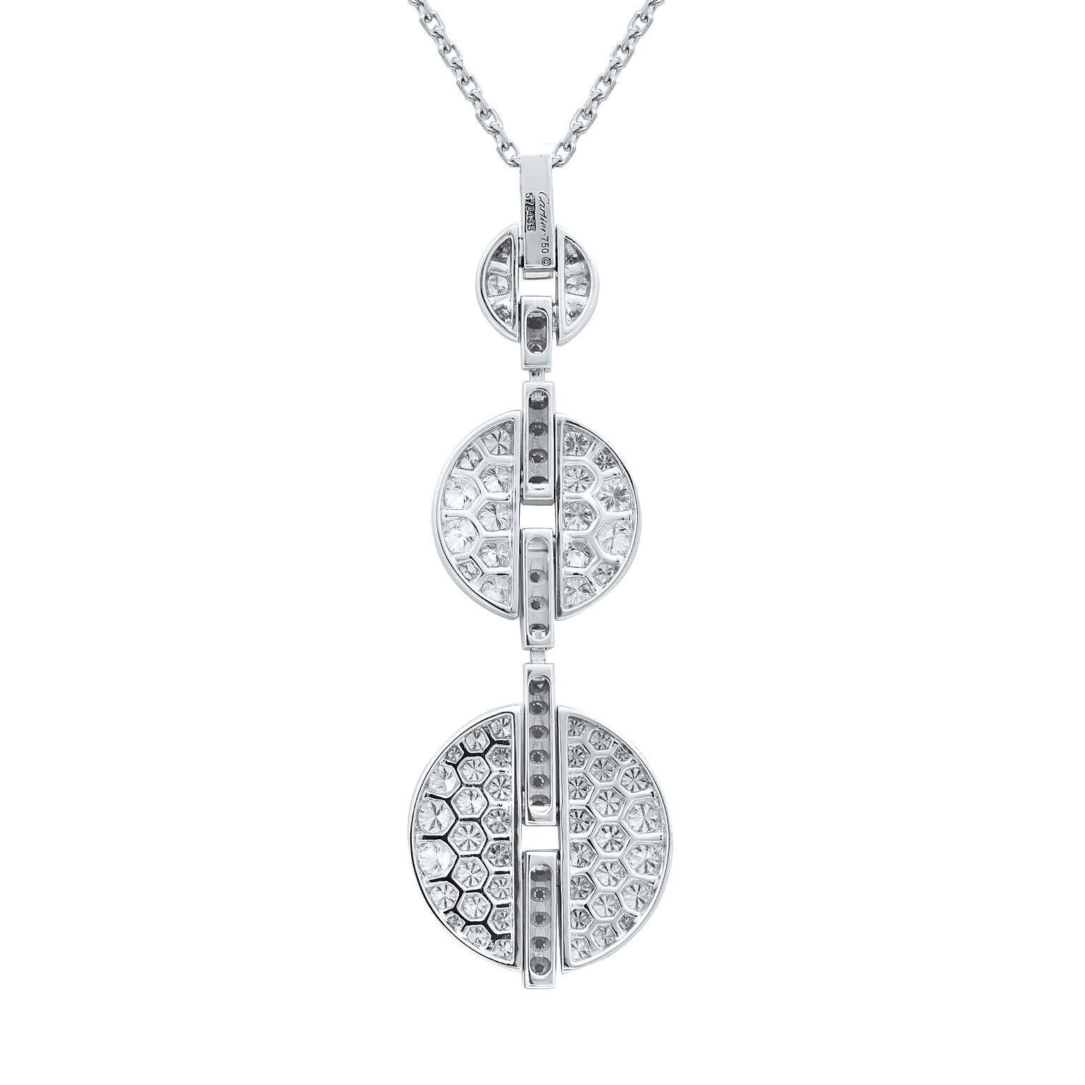 This piece is Cartier's exclusive design from Himalia Collection. This 18K white gold diamond pendant necklace comprises a full diamond triple drop pendant set with a total of 91 round brilliant cut diamonds. Carat weight: 4.55. Chain Length: 15