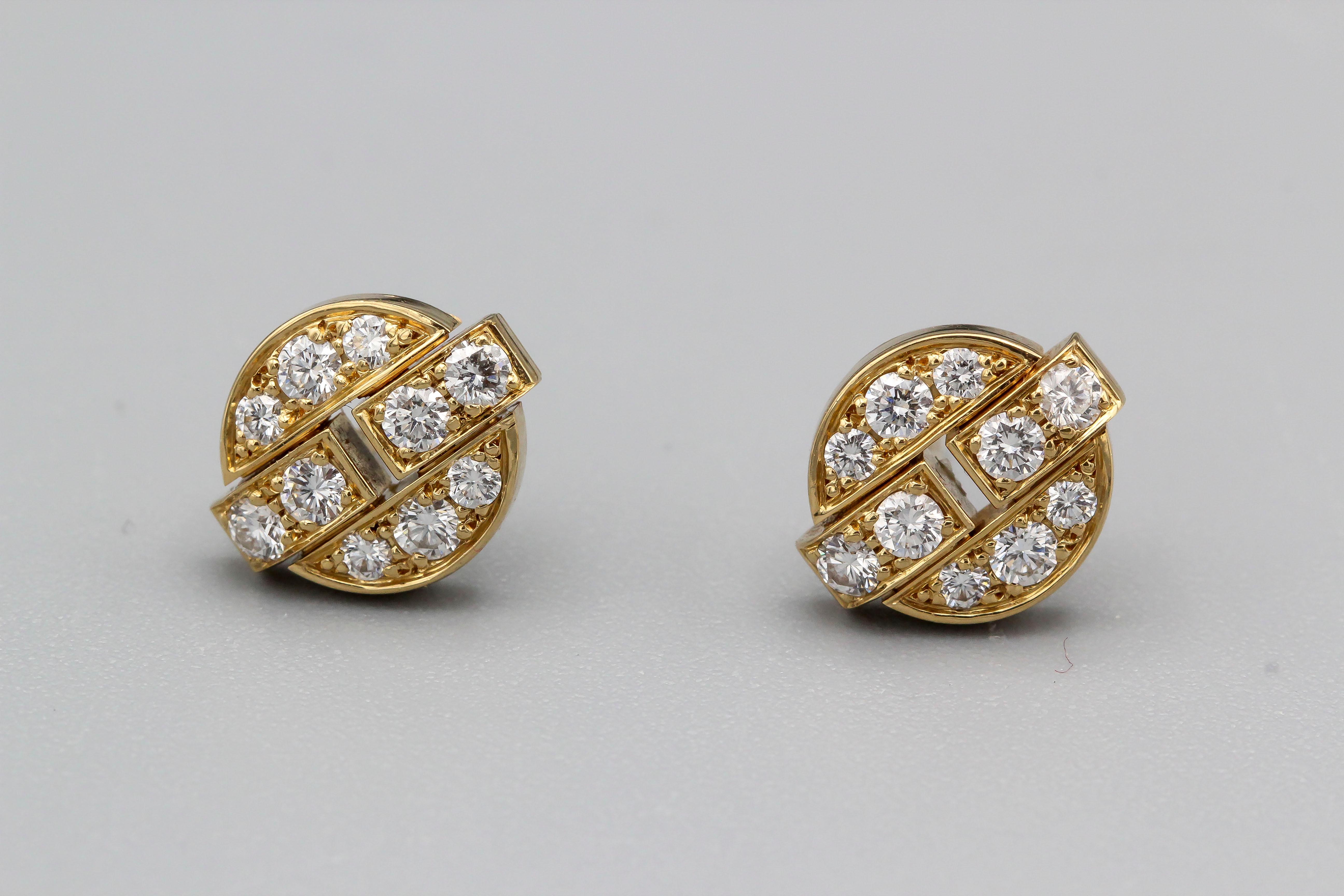 Fine pair of diamond and 18K yellow gold earrings from the Himalia collection, by Cartier, circa 2006-7. They feature high grade round brilliant cut diamonds and are designed with stud posts. Beautifully made and very elegant for any occasion. With