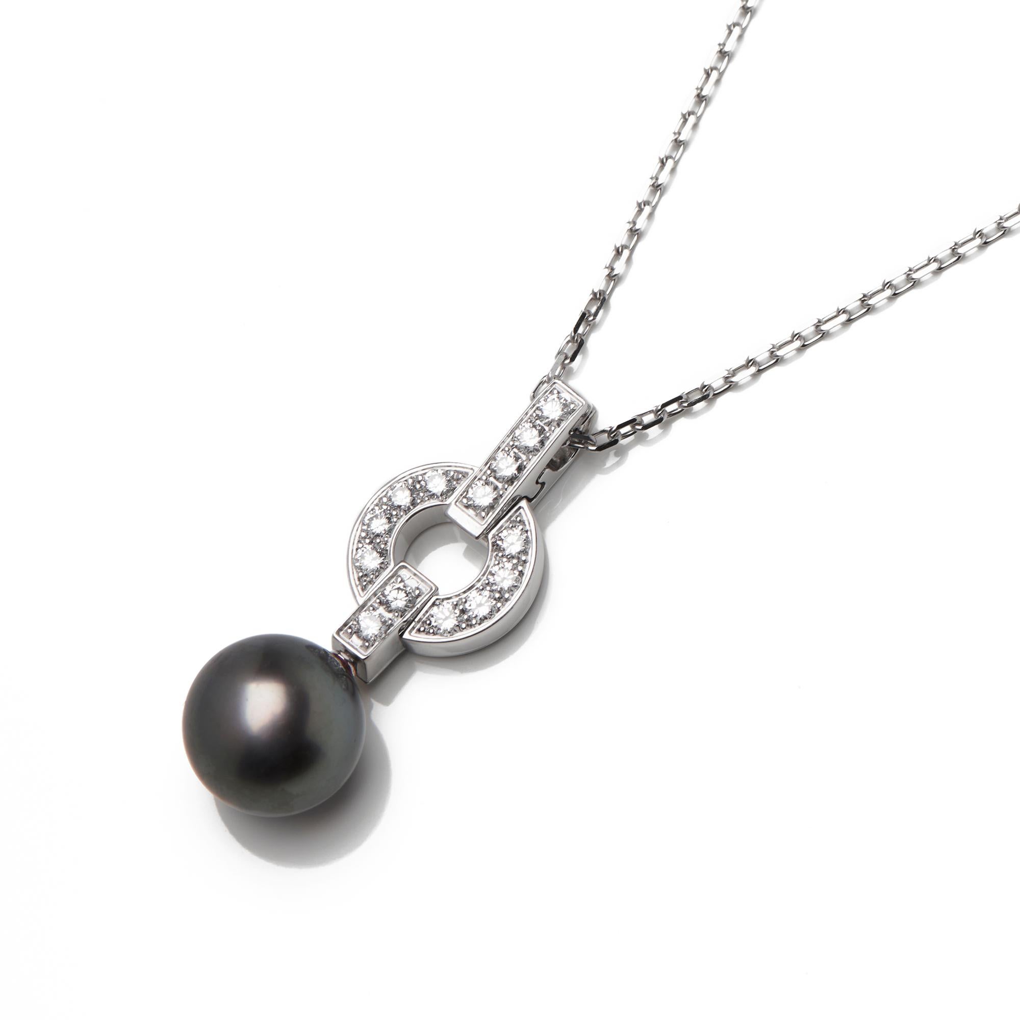 This pendant from Cartier's Himalia collection features 14 round brilliant cut diamonds totalling 0.25ct made in 18ct white gold. It also features a single round Tahitian pearl measuring 9.5mm. Accompanied with it's Cartier certificate and a Cartier