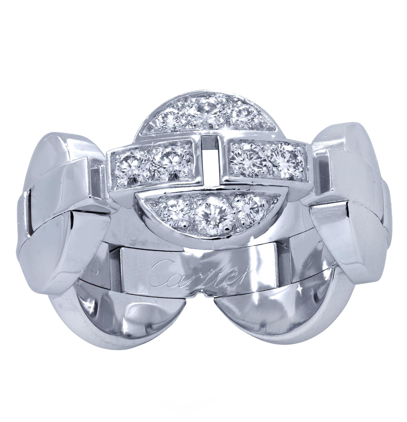 Cartier Himalia ring crafted in 18 carat white gold, featuring 10 round brilliant cut diamonds, weighing approximately 0.35 carats total, E color, VS clarity. Five circular motifs, one of which is diamond encrusted, link together to create this