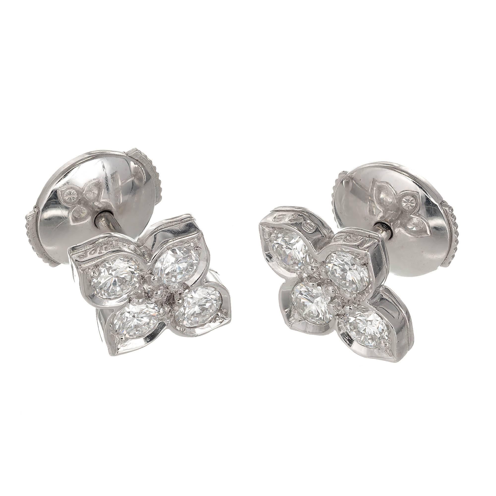 Cartier Hindu 18k white gold Diamond earrings with bright full cut Diamonds.

8 round Diamonds, approx. total weight .80cts, F, VS
18k white gold
Tested: 18k
Stamped: 750
Hallmark: Cartier 678 692 *1 TO
2.7 grams
Top to bottom: 10.54mm or .42