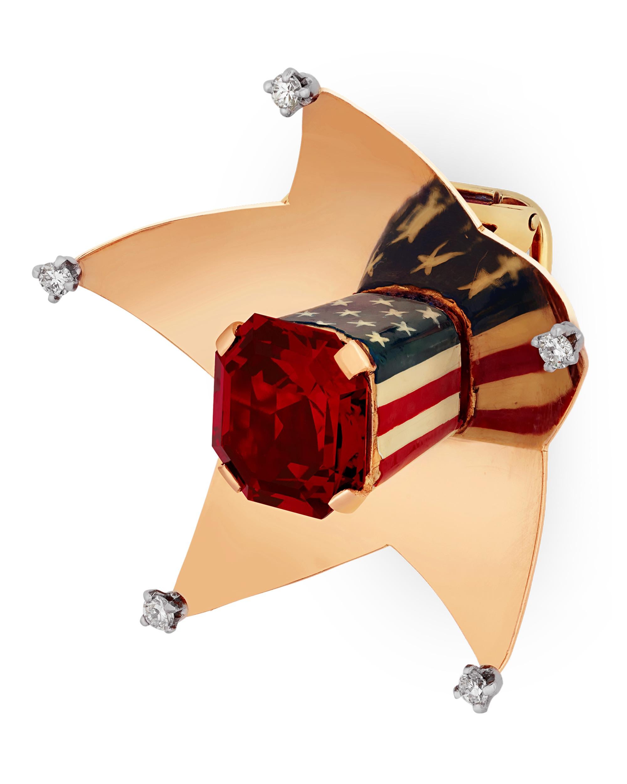 Bursting with patriotism, this original Cartier Home Front clip brooch features a 6.35-carat crimson spinel. Cartier's patented and illusory design gives the appearance of an American flag reflecting on the gold star-shaped body. The