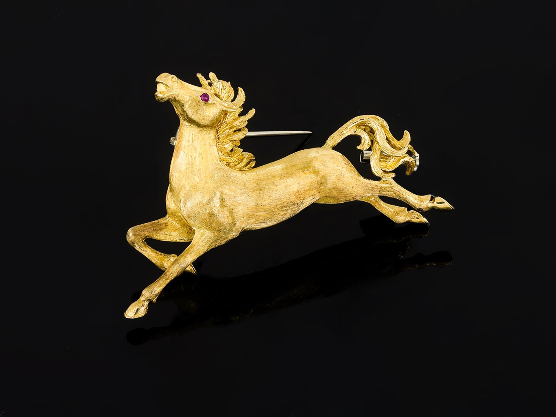Cabochon Cartier horse brooch, English, 1974.