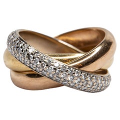Cartier Iconic Rolling Trinity Ring 18 Karat Yellow and White Gold Diamond Band