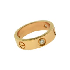 Cartier in 18 Karat Rose Gold with 3 Diamonds Love Ring