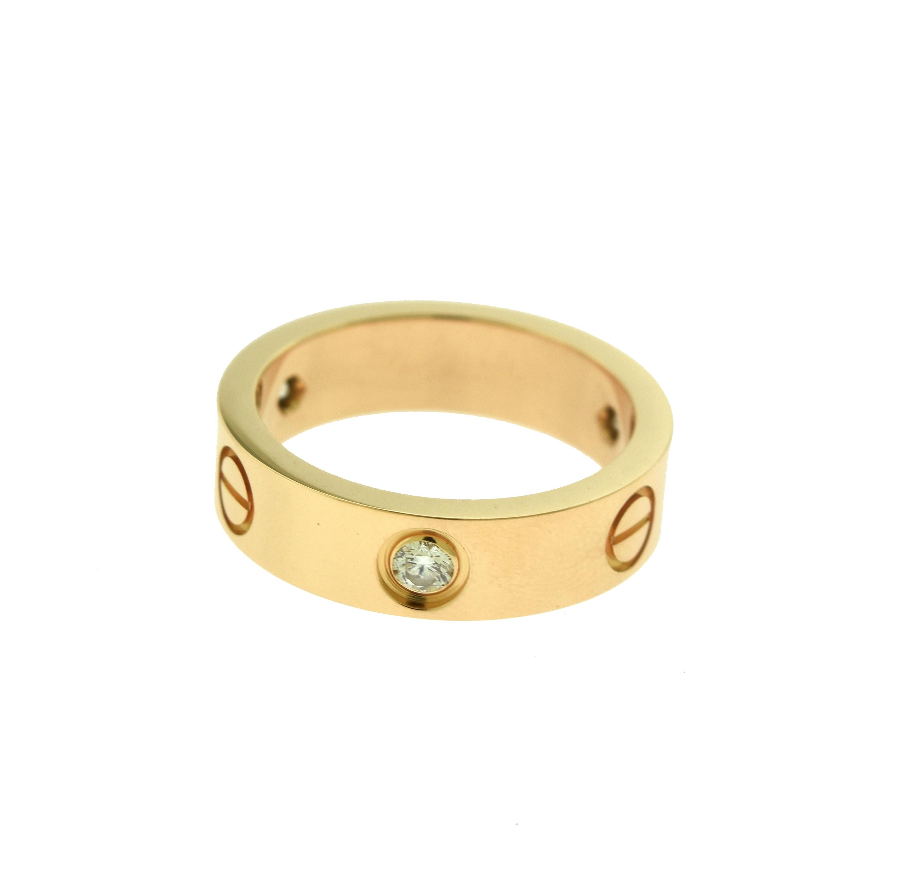 Cartier, in 18 Karat Yellow Gold 3 Diamond Love Ring In Good Condition In Miami, FL