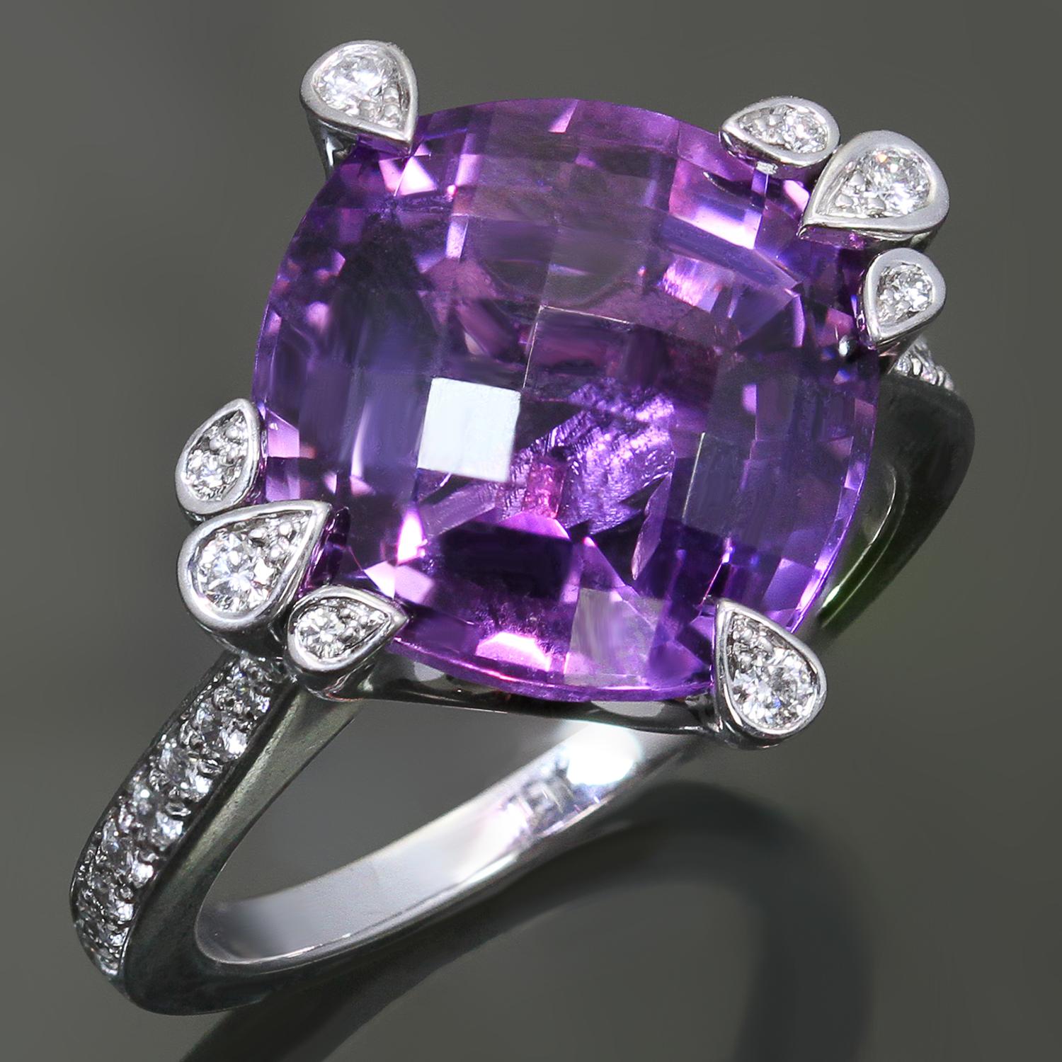 This magnificent ring from Cartier's Inde Mysterieuse collection is crafted in 18k white gold and set with a cushion-cut faceted amethyst surrounded with round brilliant diamonds weighing an estimated 0.30 carats. Made in France circa 2000s.