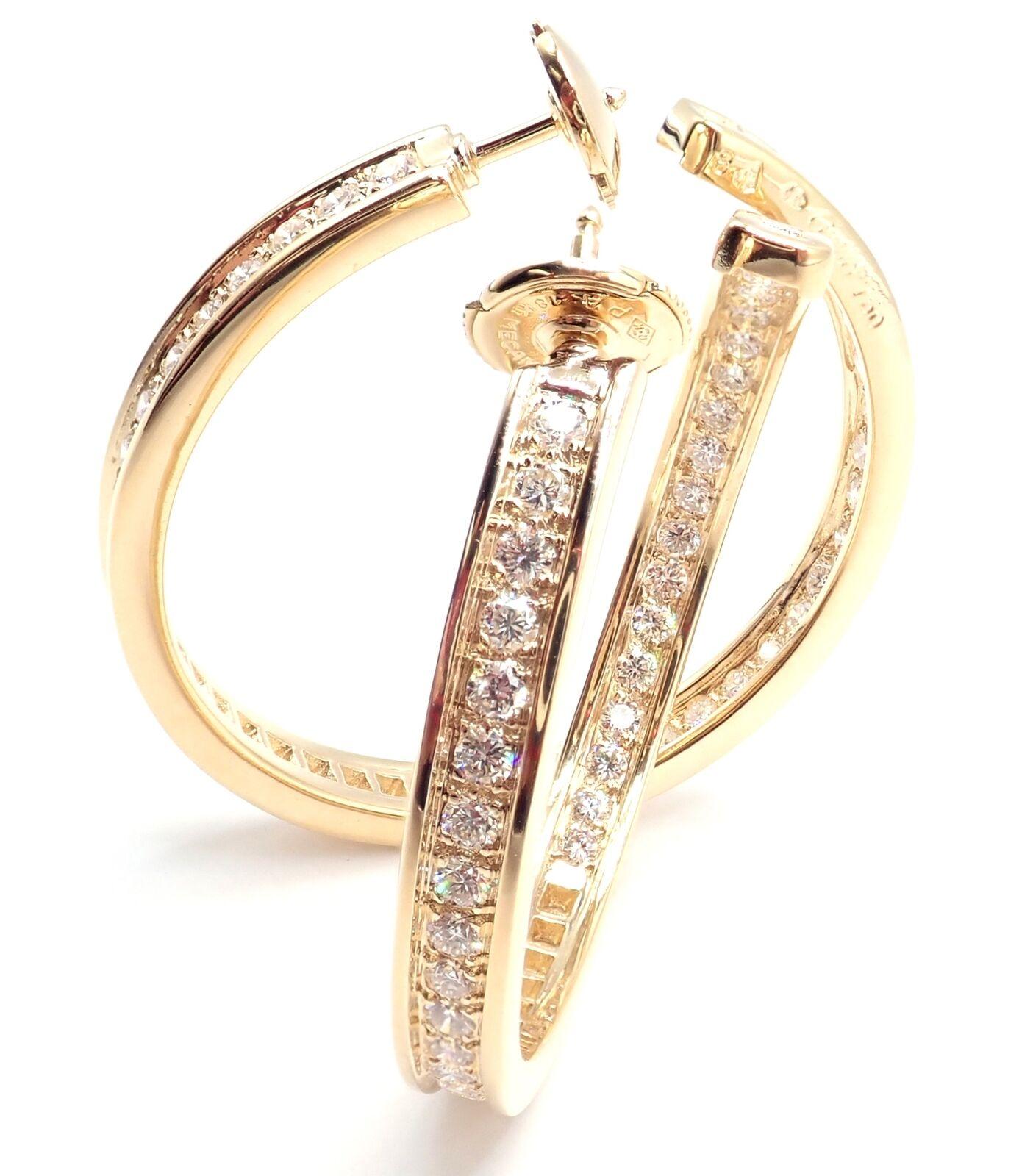 18k Yellow Gold Diamond Large hoop earrings by Cartier. 
With 90 round brilliant cut diamonds total weight approximately 2.94ct. 
Diamonds VS1 clarity, E color
These earrings come with Cartier box.
****Earrings are made for pierced ears
Details: