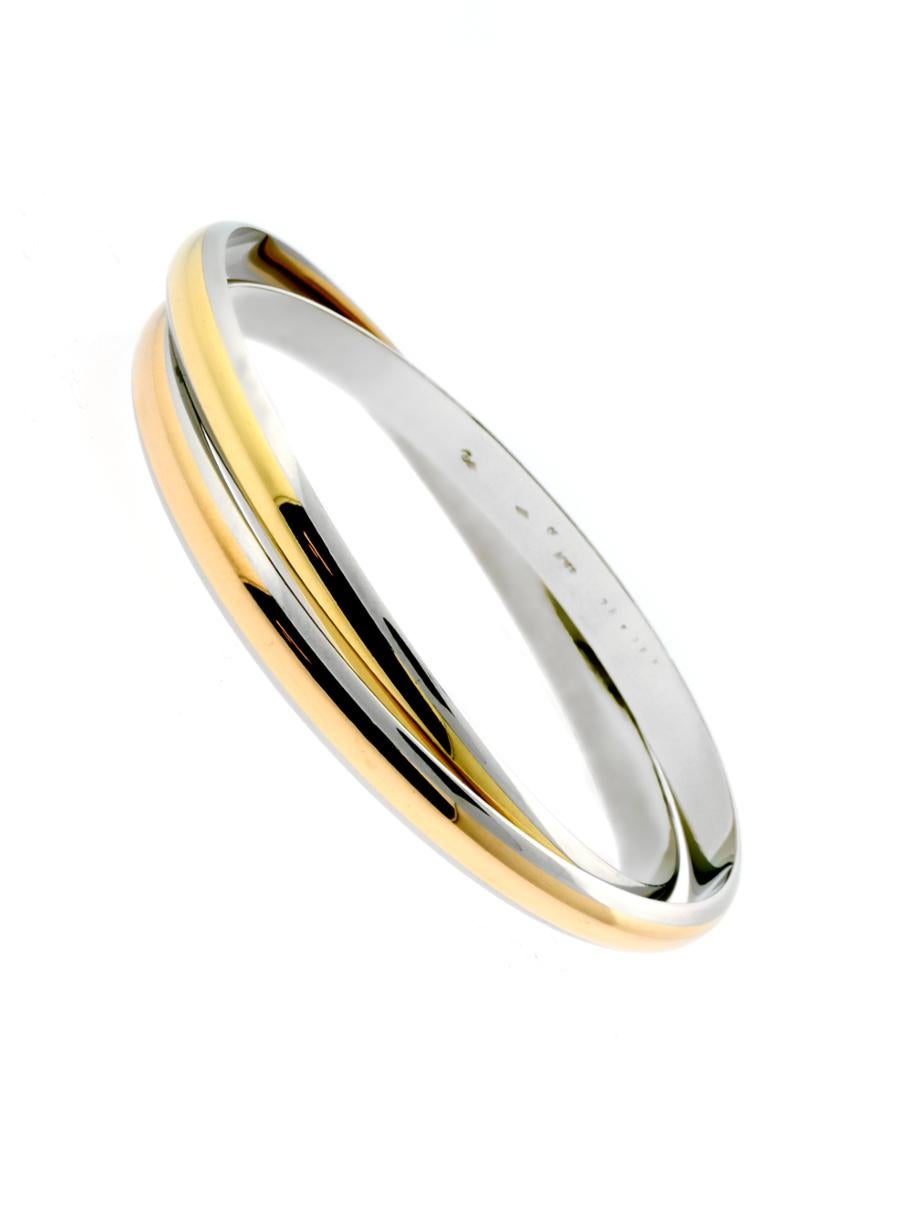 Cartier Gold-Edelstahl-Armreif mit ineinandergreifendem Cartier im Zustand „Hervorragend“ im Angebot in Feasterville, PA