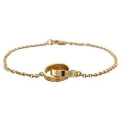 Cartier Interlocking Love Bracelet 18K Yellow Gold