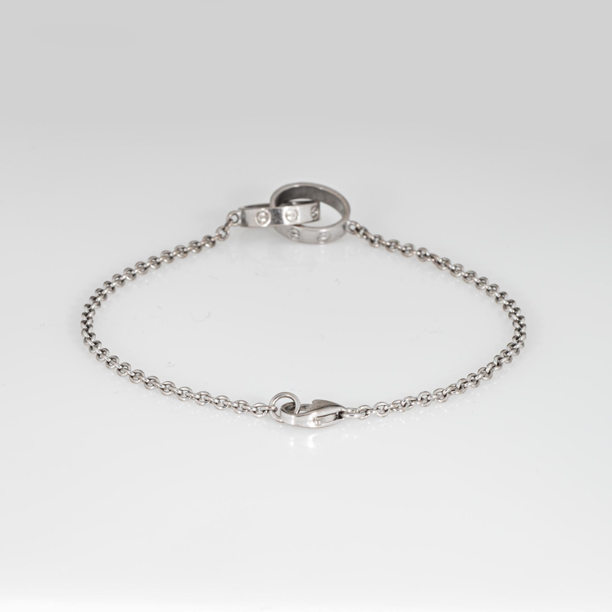 Pre-owned Cartier interlocking 'double' love bracelet crafted in 18 karat white gold (circa 2021).  

The LOVE collection is an iconic symbol of love that transgresses convention. The double Love bracelet measures 7 inches in length and is great