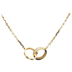 Vintage Cartier Interlocking Ring Love Necklace with Diamonds in 18 Karat Pink Gold, Box