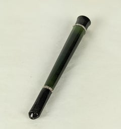 Cartier Zigarettenhalter aus Jade, Onyx und Diamanten. Original Box