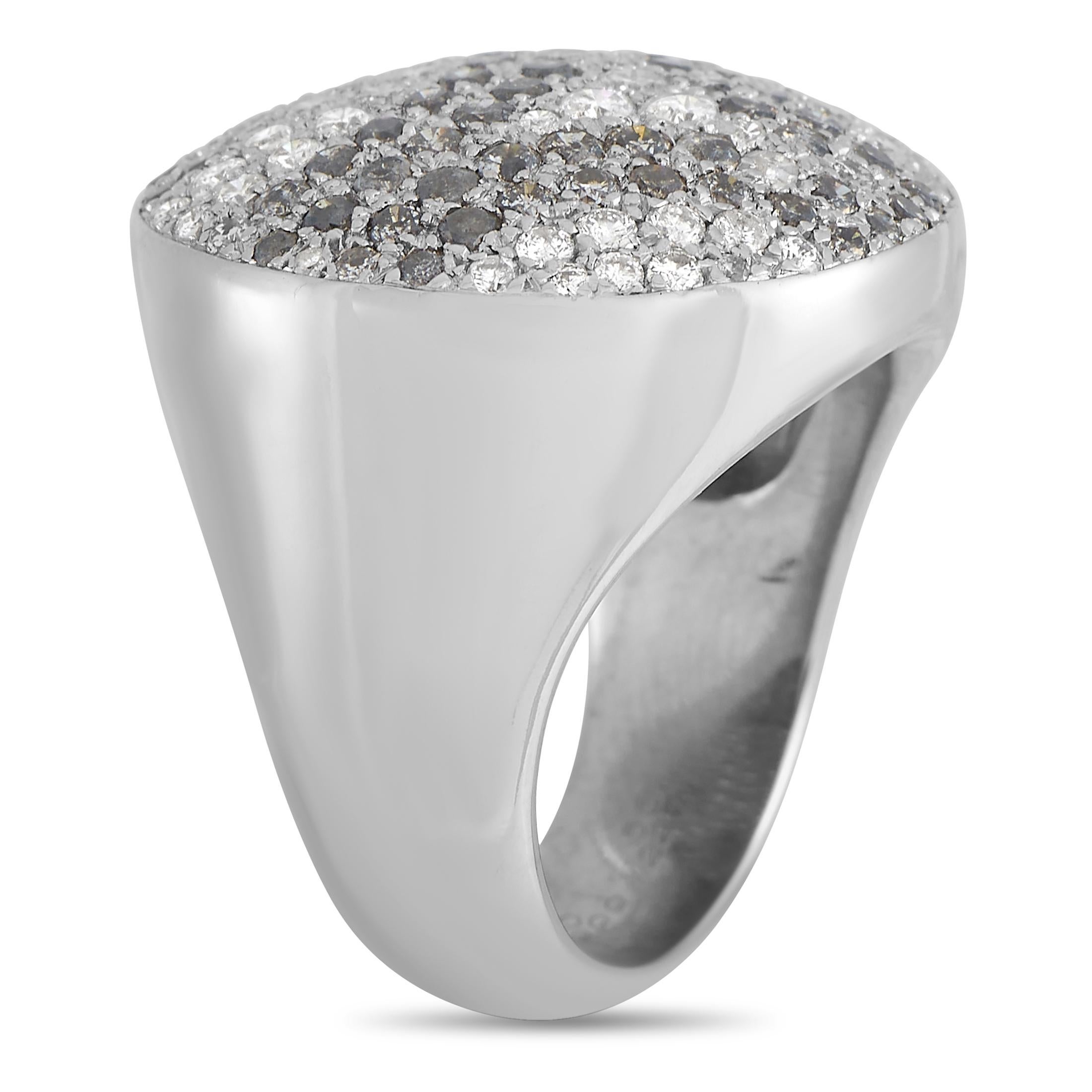 This impeccable piece from the Cartier Jeton Sauvage collection manages to be attention-grabbing and understated all at once. Atop the bold 18K White Gold setting - which features a 5mm band and a 3mm top height - you’ll find a circular array of