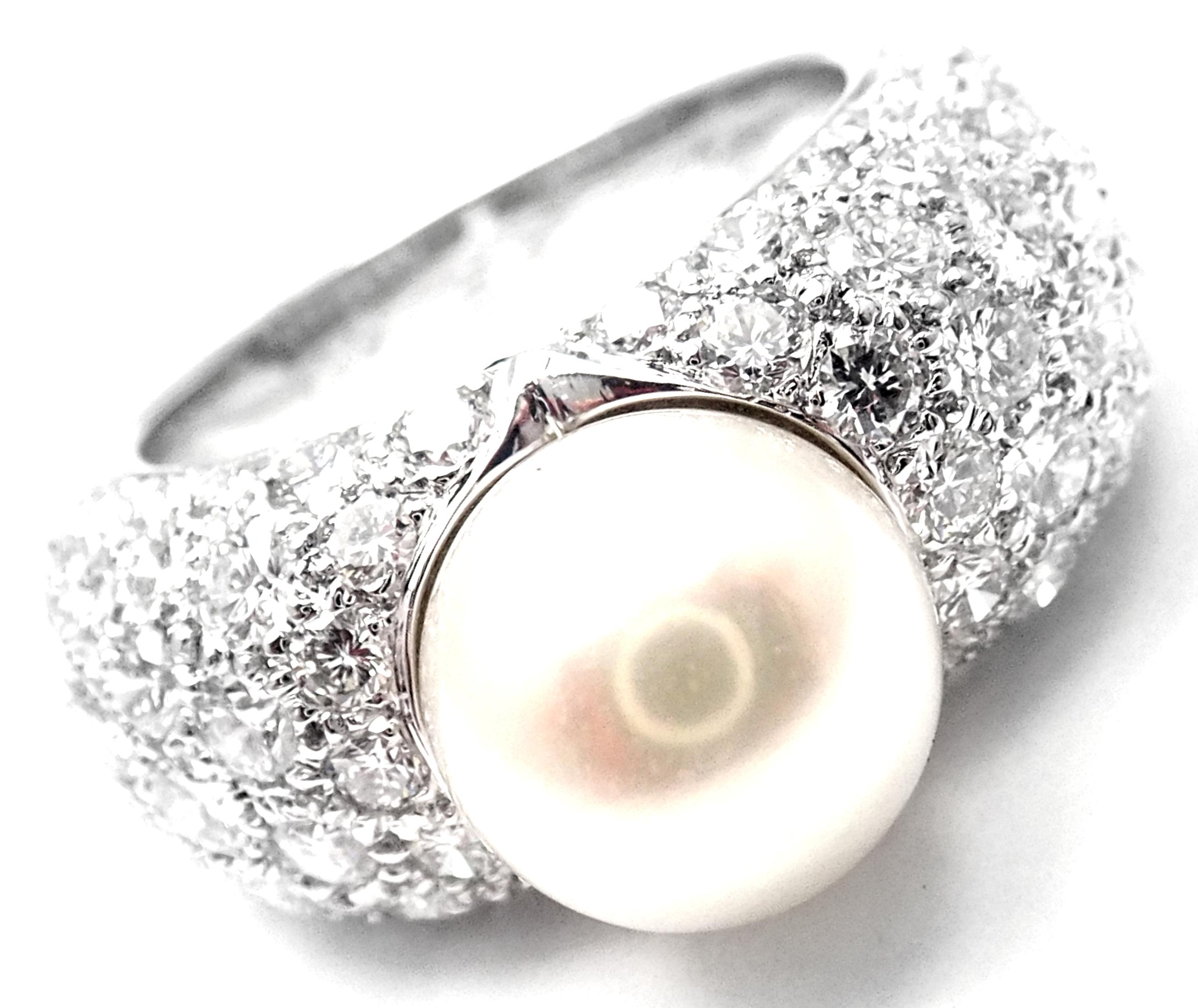 18k White Gold Diamond And Cultured Pearl Juliette Ring by Cartier. 
With 90 Round Brilliant Cut Diamonds VVS1 clarity, E color 
total weight approx. 5ct and 1 cultured pearl 9mm
This ring is in mint condition and it comes with original Cartier