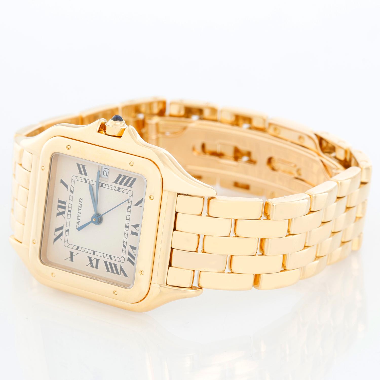 Cartier Jumbo Panther 18k Yellow Gold Men's Quartz Watch with Date W25014B9 - Quartz. 18k yellow gold case (27mm x 37mm). Ivory colored dial with black Roman numerals and date at 3 o'clock. 18k yellow gold Cartier Panther bracelet with deployant