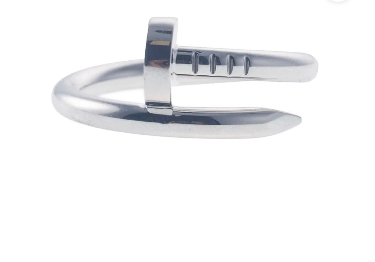 CARTIER
18K White Gold Juste Un Clou Ring 49
comes with original box 
18 Karat white Gold Weight 3.5GM  
White Gold
Serial # IJZ277
Ring Size 49, US 5
Used excellent  condition
Authenticity and money back is guaranteed.
FOLLOW MonalisaJewelry Inc.