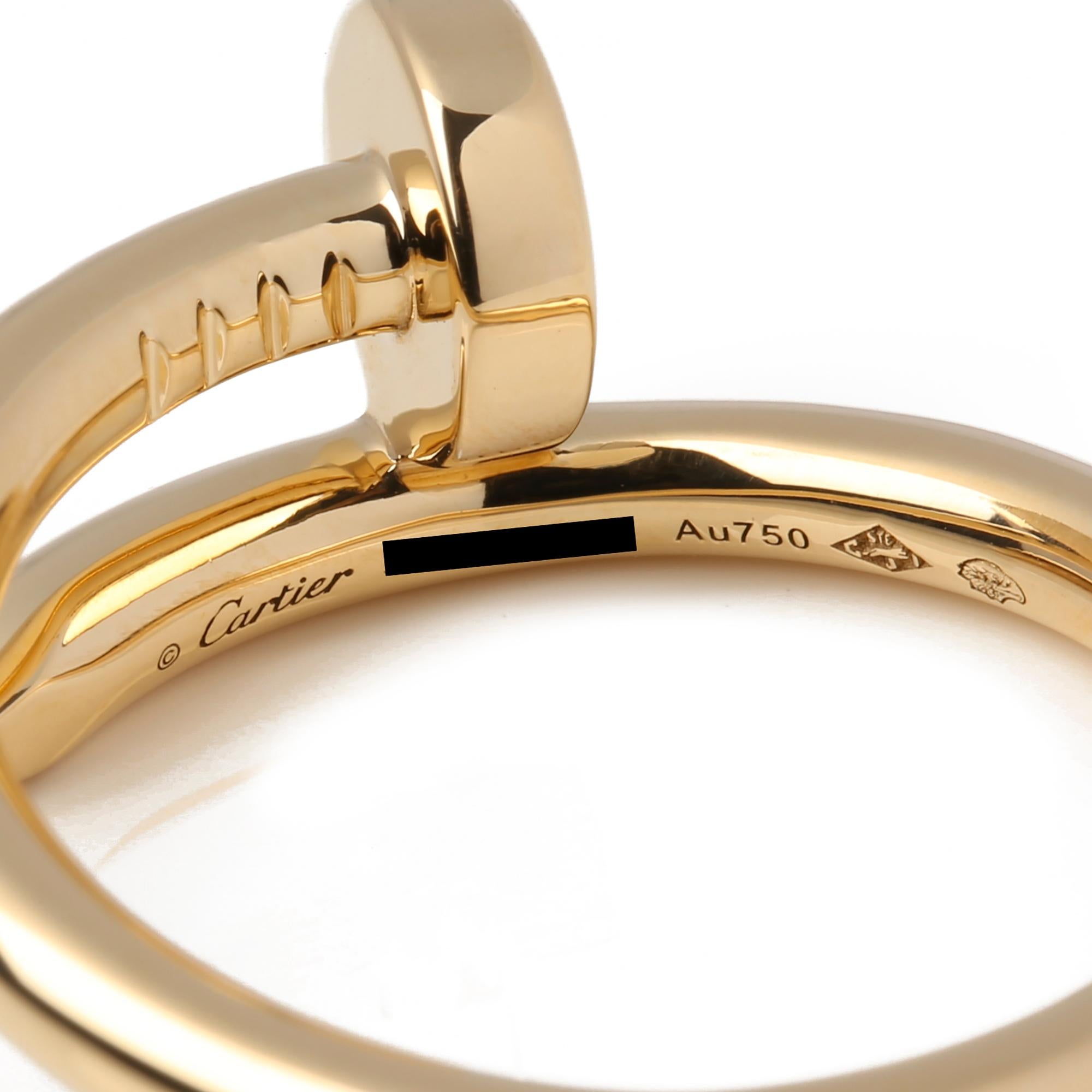 This ring from Cartier is from their Just en Clou collection and features their signature nail design, made in 18ct yellow gold. UK ring size P. EU ring size 57. US ring size 7 1/2. Accompanied with it's original Cartier box and certificate. Our