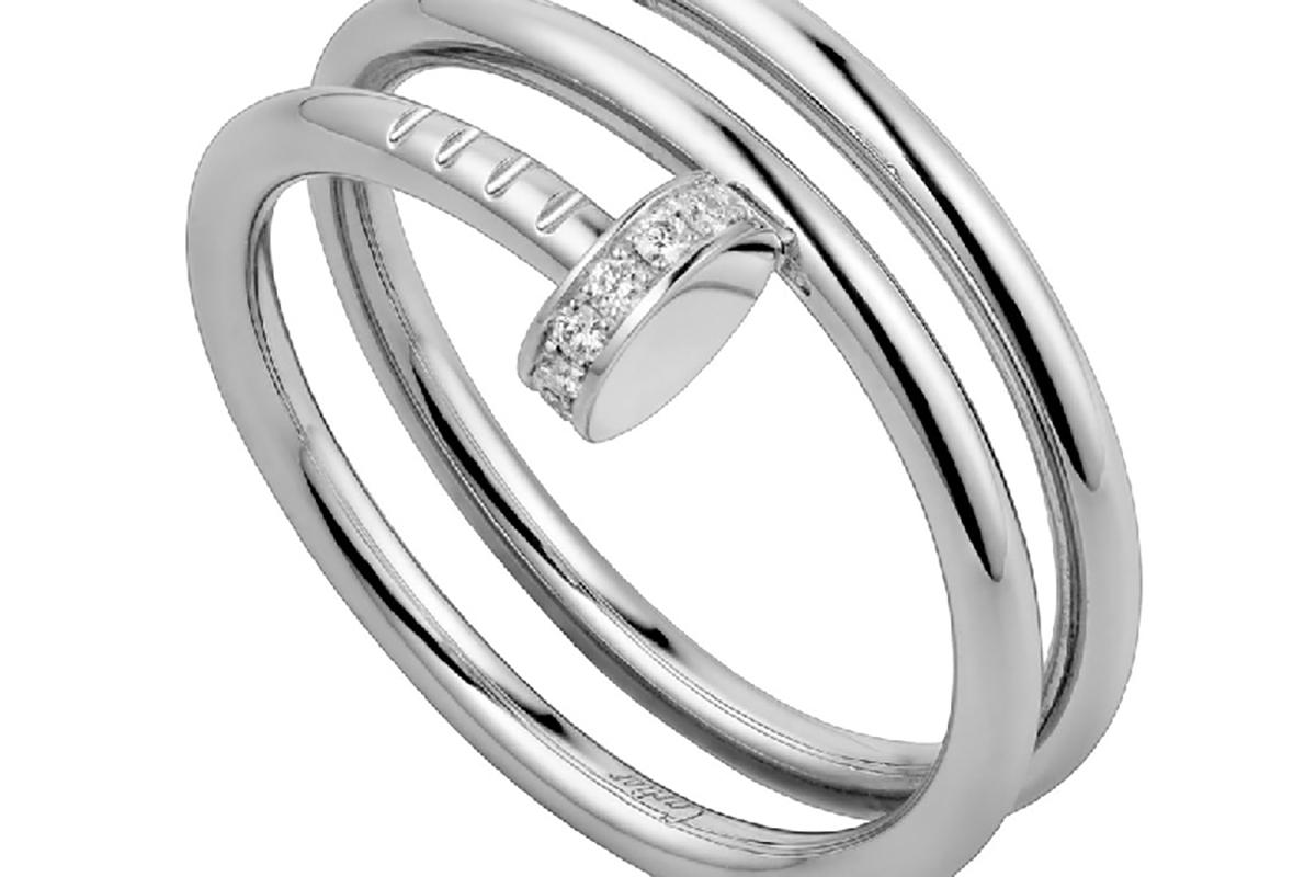 JUSTE UN CLOU RING
WHITE GOLD, DIAMONDS
A beautiful Cartier Juste un Clou ring made in 18K white gold, set with 14 brilliant-cut diamonds, total weight 0.08 carats. Re: B4211000

Size: EU 51 US 6
Weight: approximate 5.81g
This item will come with a