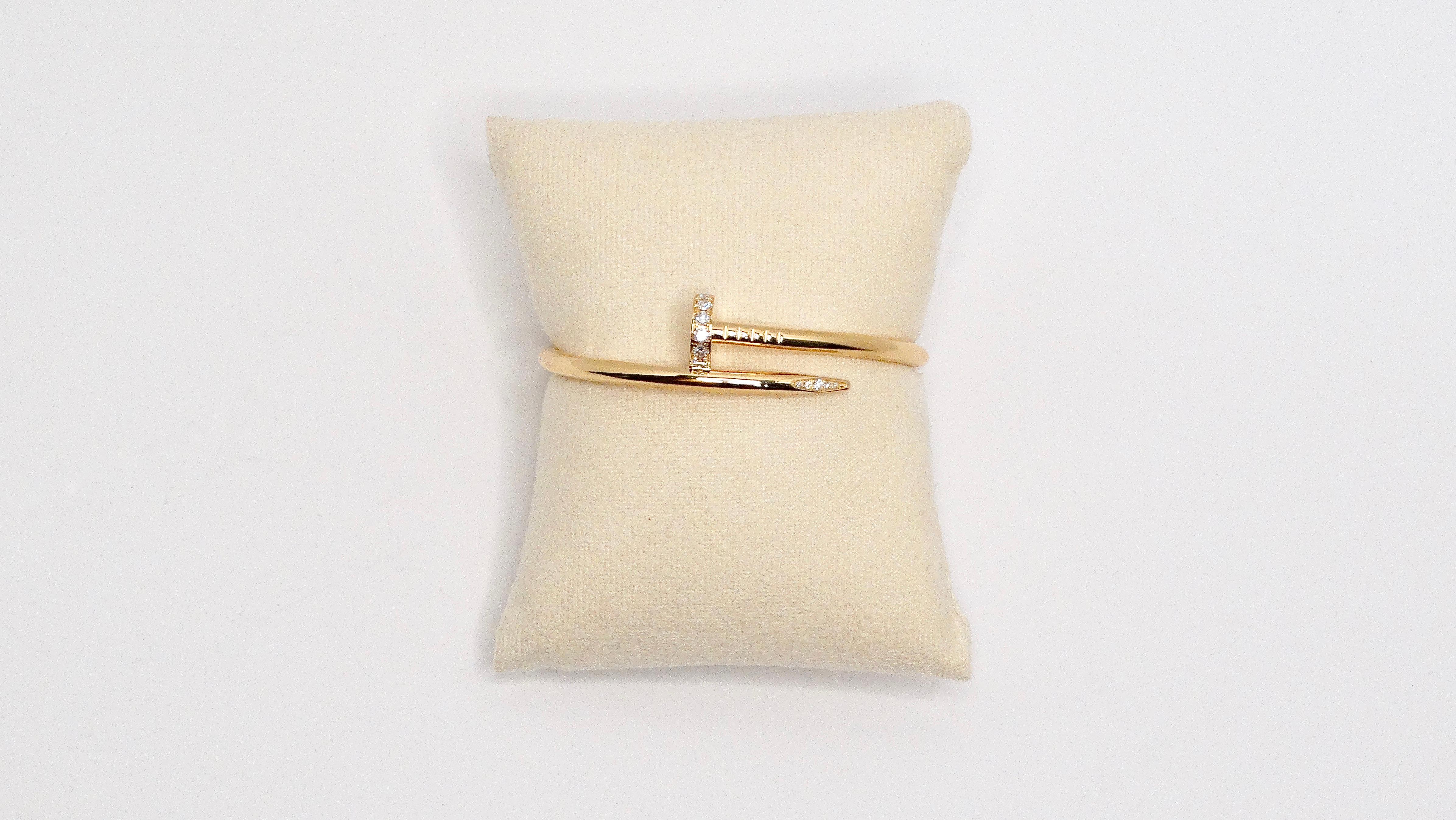 The Cartier Juste Un Clou 18k Gold & Diamond Bracelet is a stunning embodiment of the brand's innovative spirit and timeless elegance. Crafted in luxurious yellow gold with exquisite diamond stone detailing, this bracelet is designed in the iconic