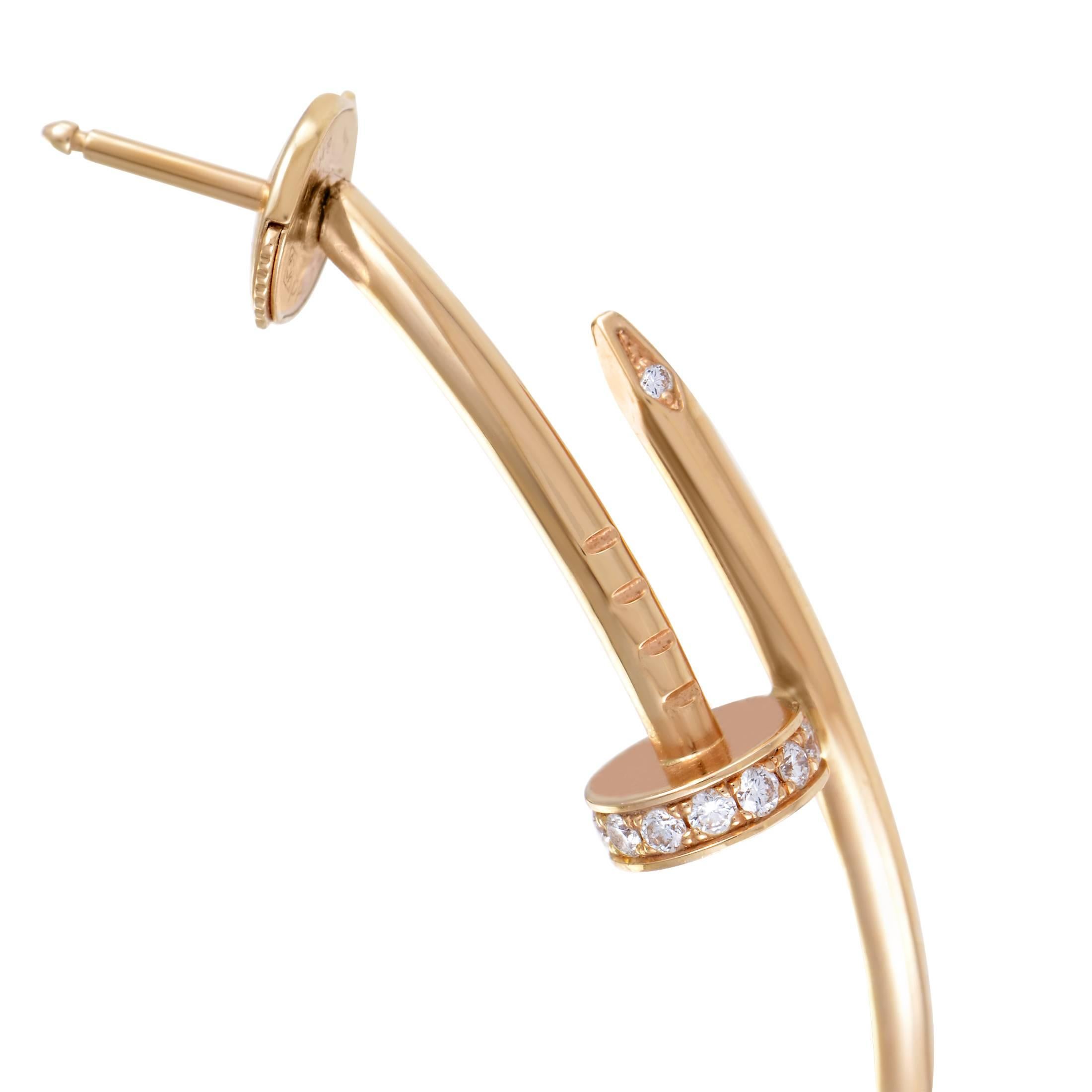 These iconic hoop earrings from the Cartier Juste un Clou collection bring one of the brand’s signature elements to life. Sleek and simple, the “nail” shaped design is crafted from radiant 18K Rose Gold. An array of diamonds add an exquisite