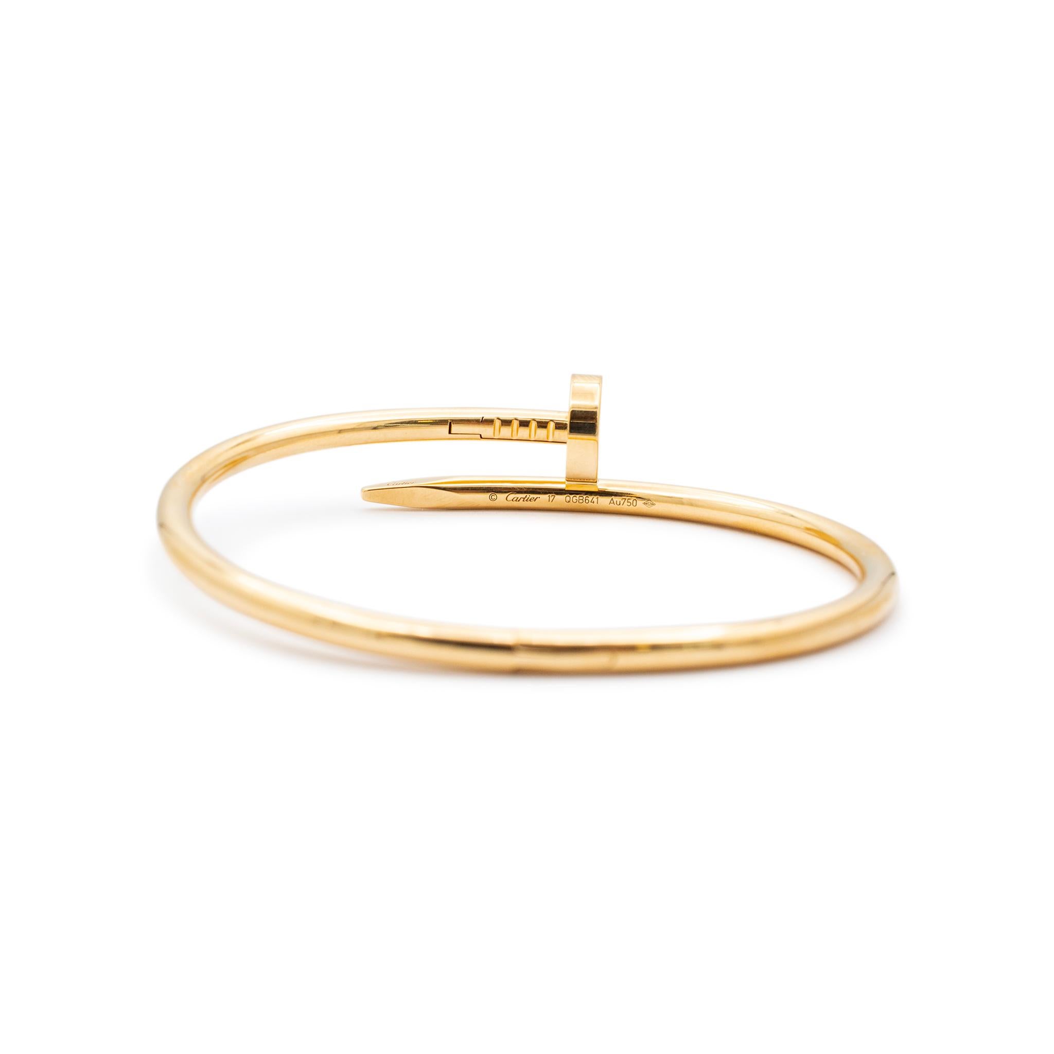 Brand: Cartier

Gender: Ladies

Metal Type: 18K Yellow Gold

Cartier Size: 17

Length: 6.00 Inches

Width: 3.50 mm

Weight: 32.90 grams
Ladies 18K yellow gold bangle bracelet. The metal was tested and determined to be 18K yellow gold. Engraved with
