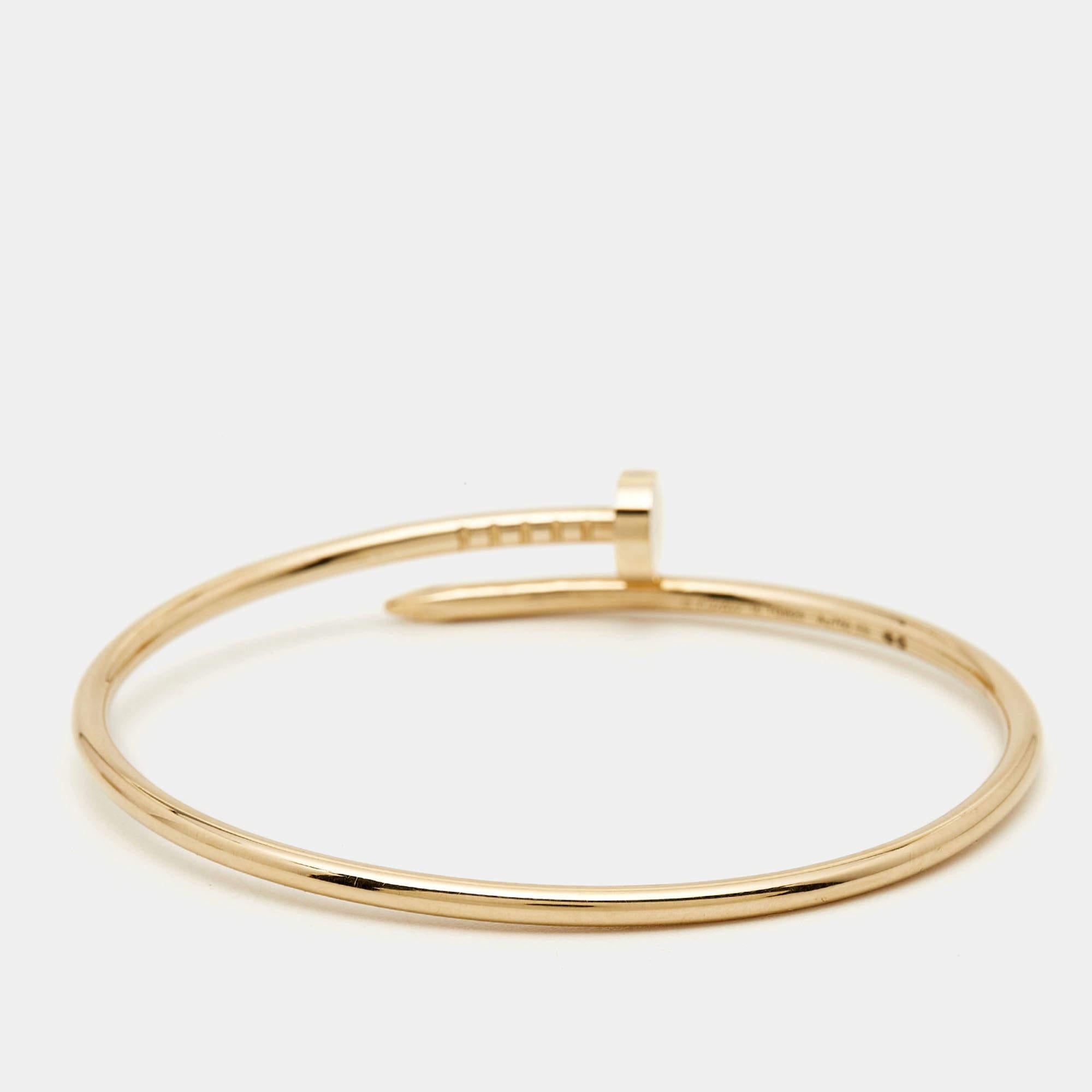The Cartier Juste Un Clou bracelet is an iconic and luxurious piece of jewelry. Crafted from gleaming 18k yellow gold, its sleek and minimalist design captures the essence of a nail transformed into an elegant and distinctive fashion