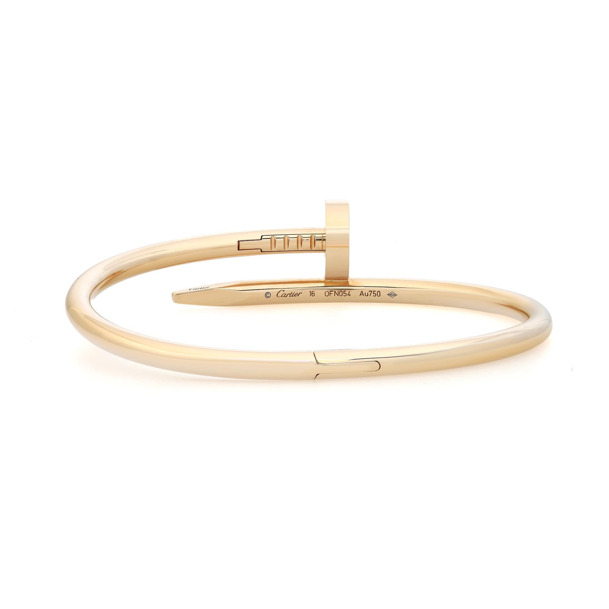Cartier Juste un Clou bracelet, medium model, crafted in 18K yellow gold. Size 16. Width 3.5 mm. Excellent preowned condition. The bracelet is marked 