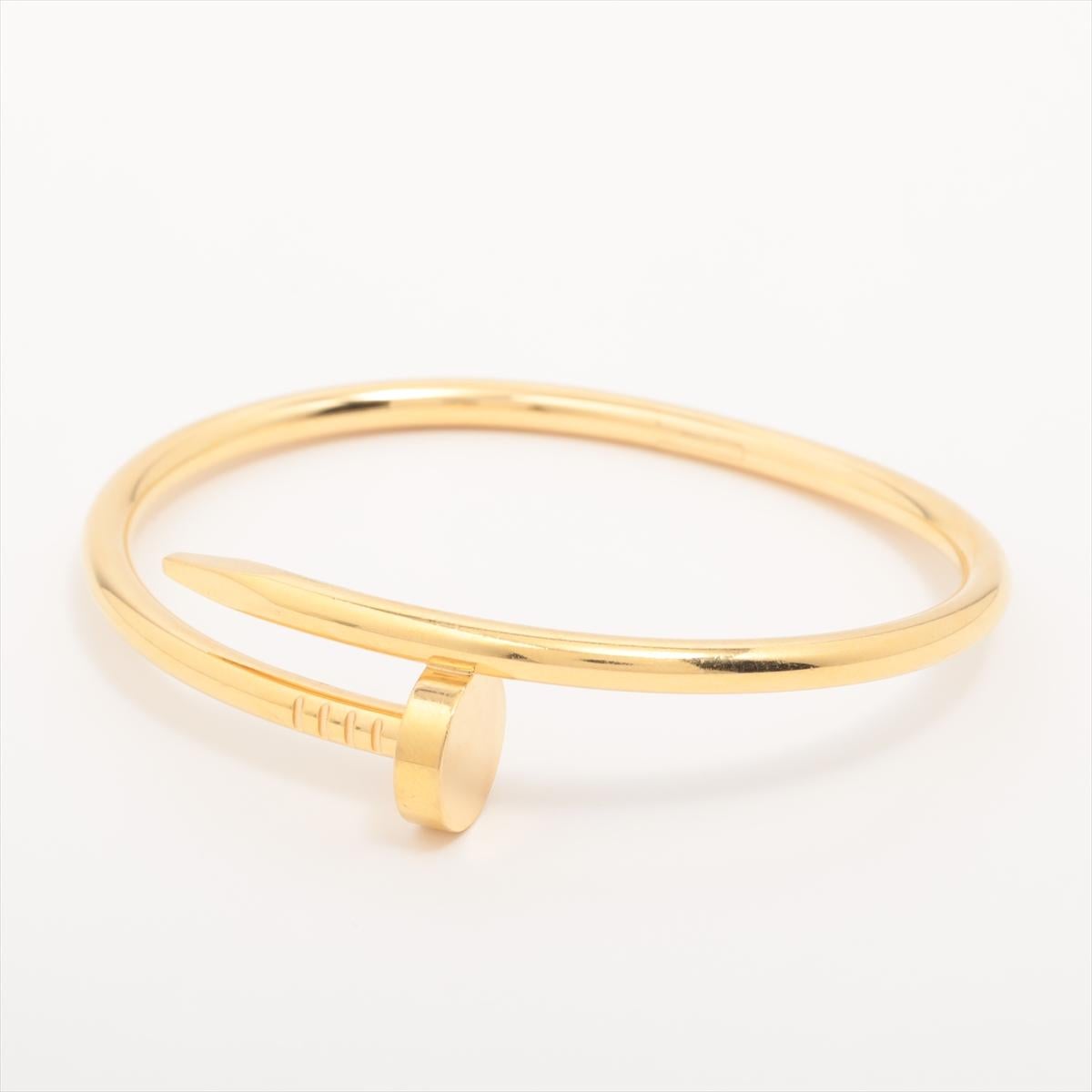 Brand : Cartier
Description:  Cartier Juste un Clou Bracelet 750YG
Metal Type: 750 (YG) /  Yellow Gold
Total Weight: 34.1g
Size: 17
Width: 3.5mm
Condition: Preowned; small signs of wearing
Box -  Included
Papers -  Included
