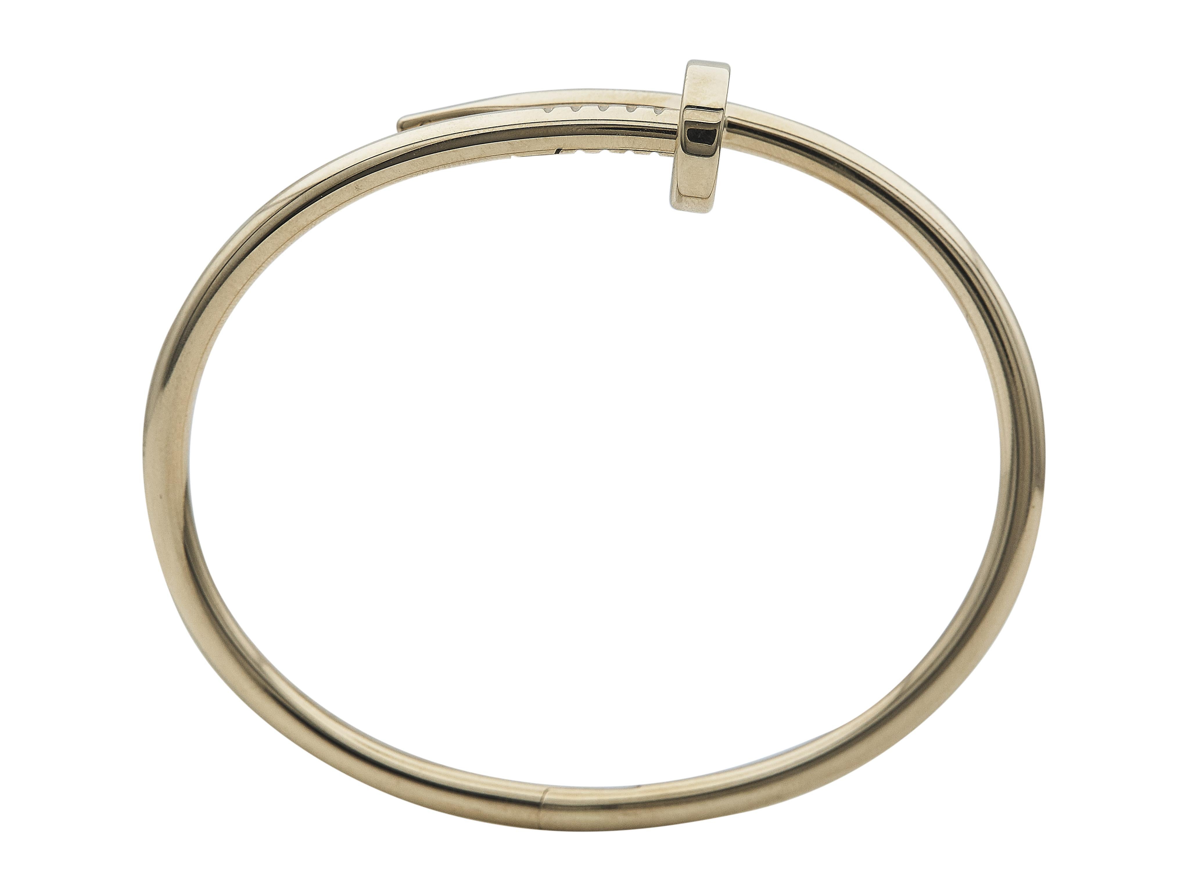 The bracelet:
A Cartier Juste un Clou Bracelet. This Classic model is in 18K yellow gold, measuring to a size 17.
Accompanied by…
Original box
Certificate of authenticity
Service paper
Invoice

The bracelet is in excellent condition, with only a few