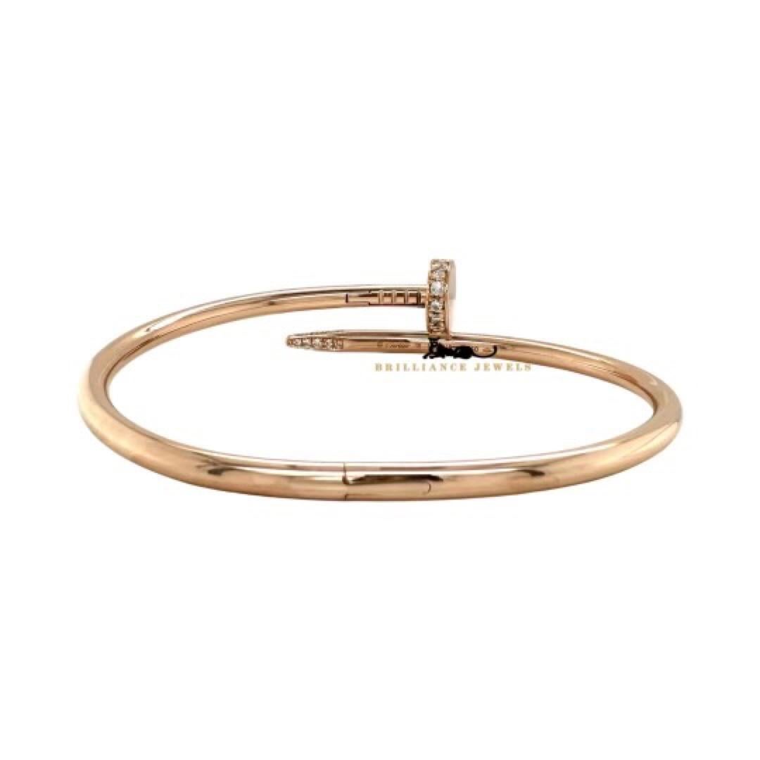 Designer: Cartier

Collection: Juste Un Clou

Style: Bracelet

Metal: 18k Rose Gold​​​​​​​

Opening System: ​​​​​​​New System

Bracelet Size: 18

Hallmarks: Cartier; 750, 18, Serial # 

Stone: Custom added round diamonds

Includes: 24 Months