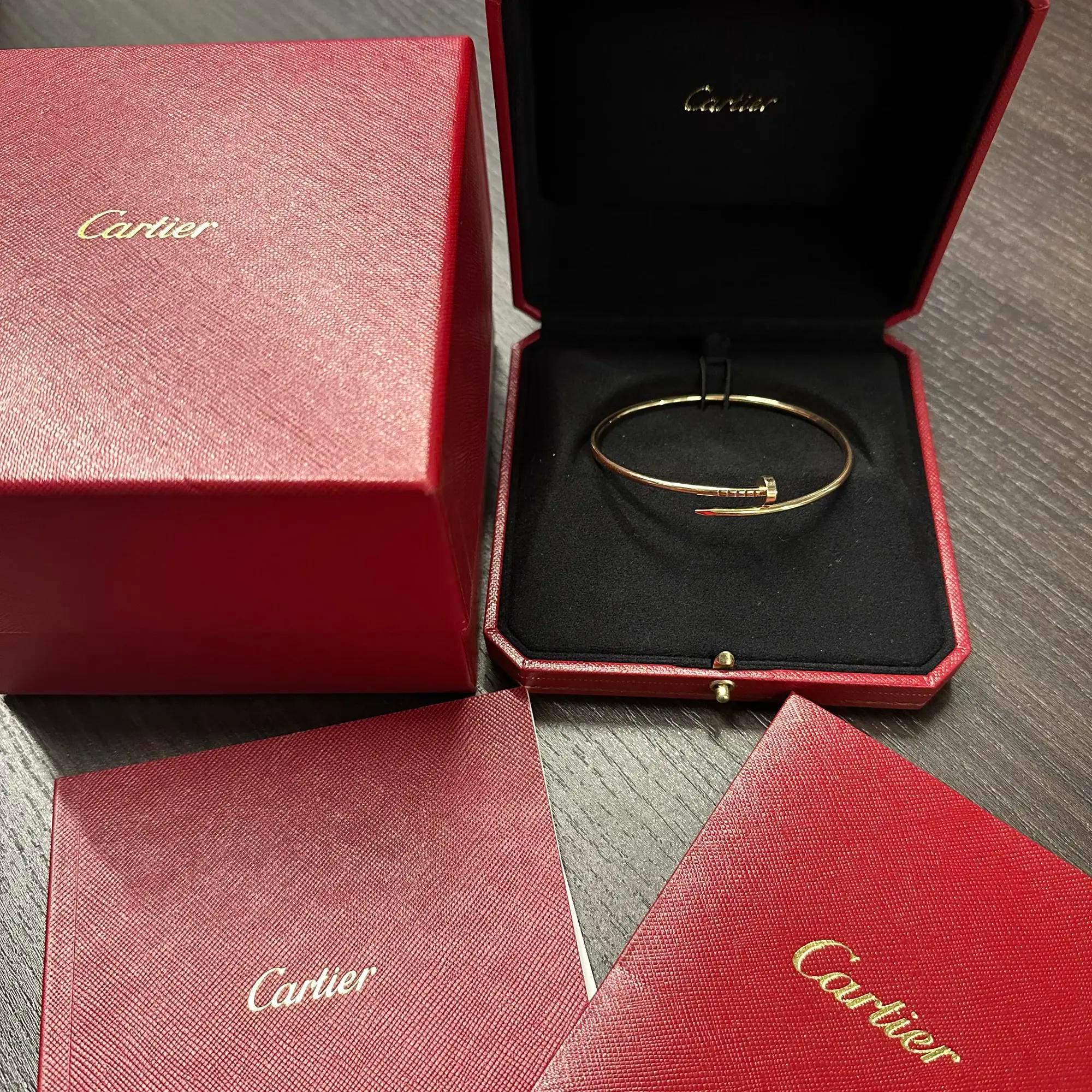 Cartier Juste un Clou bracelet. Small model. Crafted in 18K rose gold. Width: 2.5mm. Size 19. Total weight: 10.55 grams. Excellent preowned condition. Comes with the original box and papers. 
